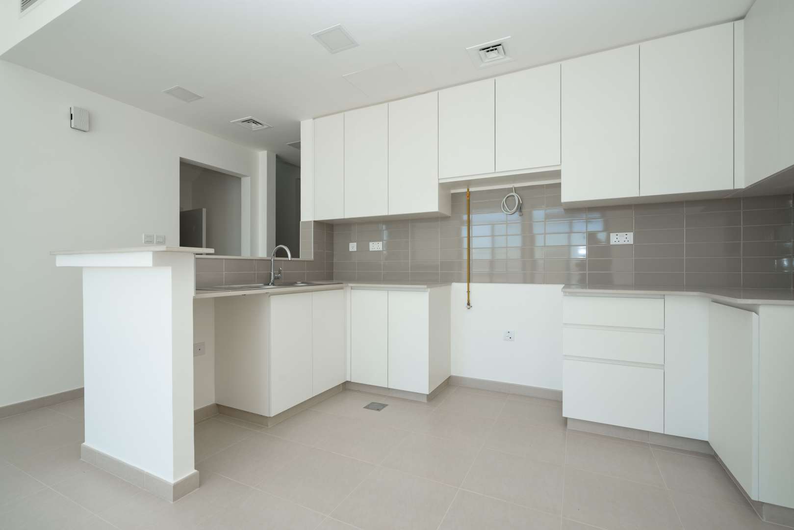 Skate park near Naseem Townhouses, Town Square, with colorful lines and ramps