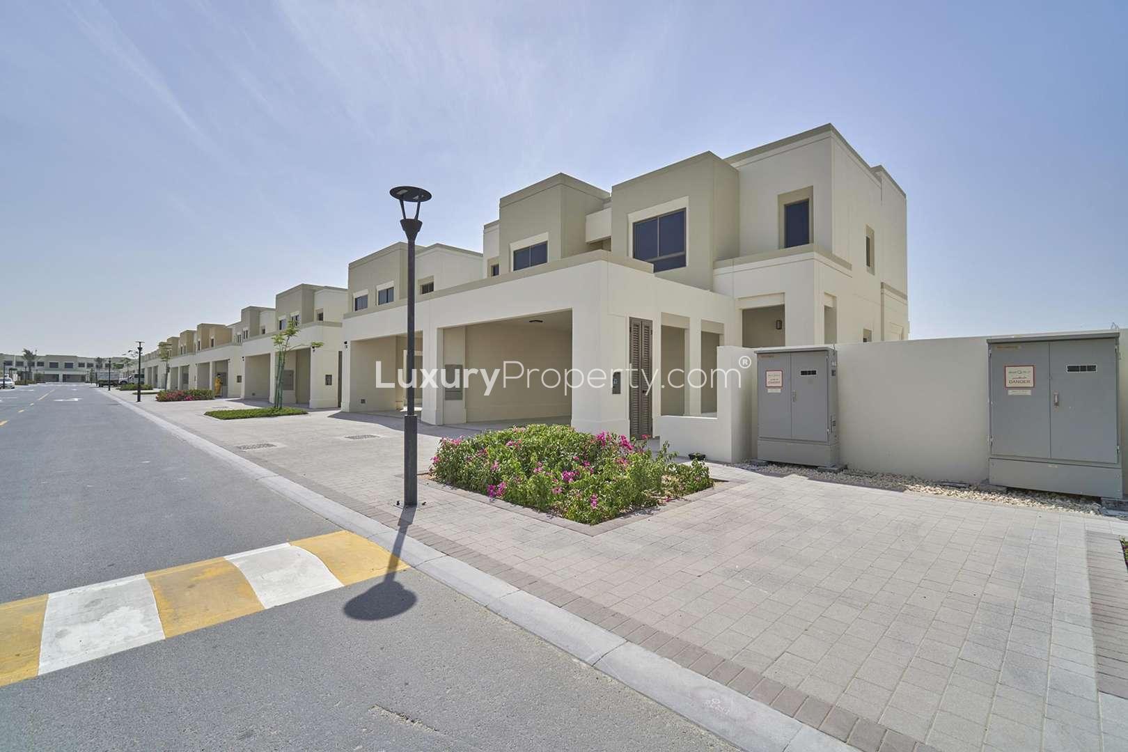 Elegant townhouse community pool in Naseem Townhouses, Town Square. Ideal rental property location