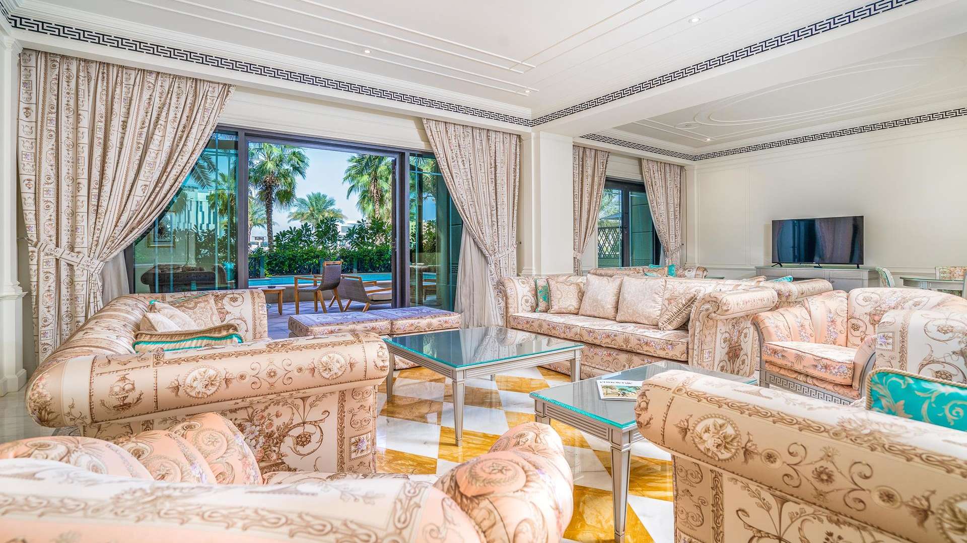 Elegant living area with dining set in 4-bedroom townhouse, Palazzo Versace Residences, Culture Village