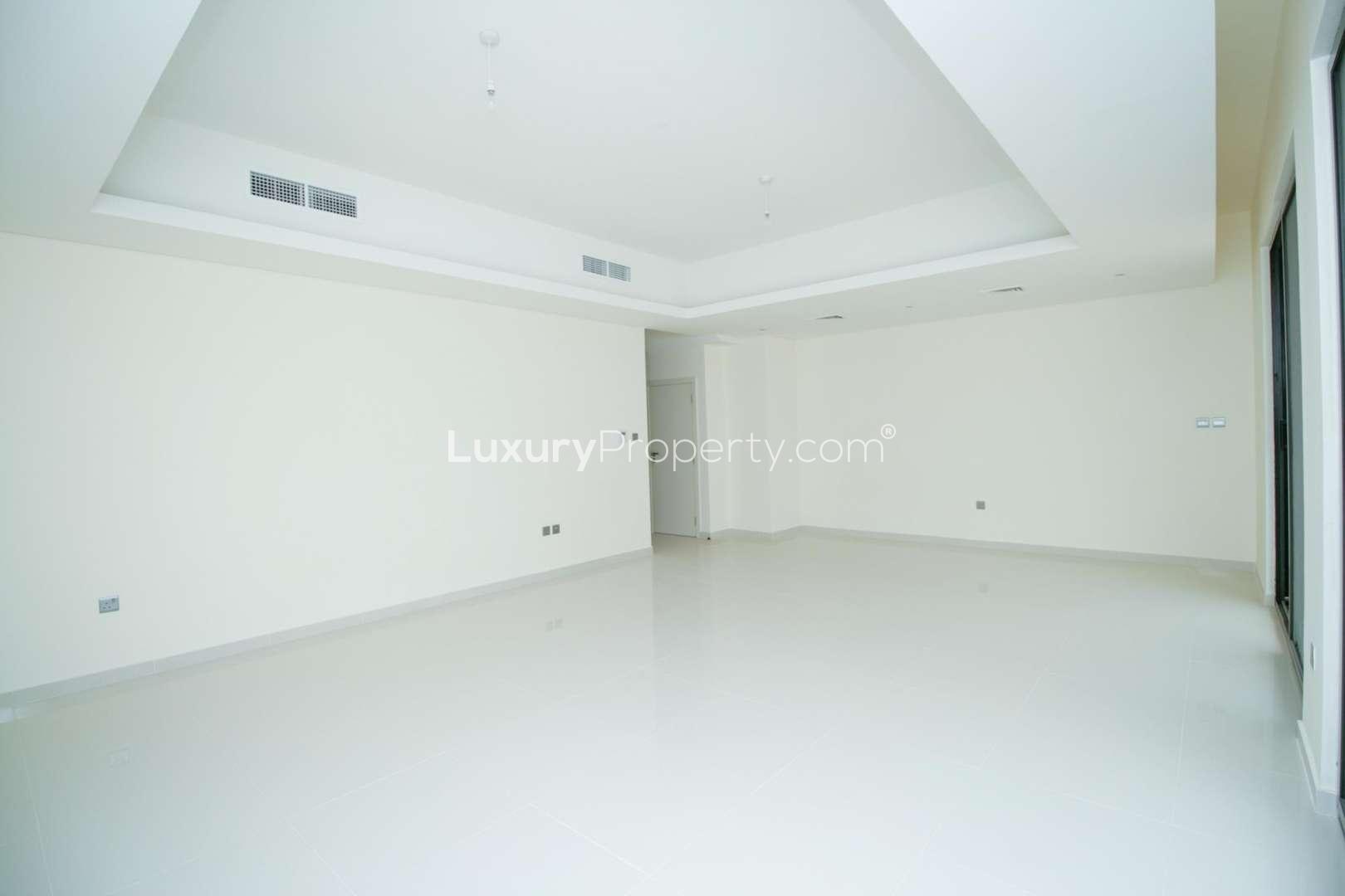 Spacious living room in four-bedroom townhouse, Primrose, Akoya community, available for rent