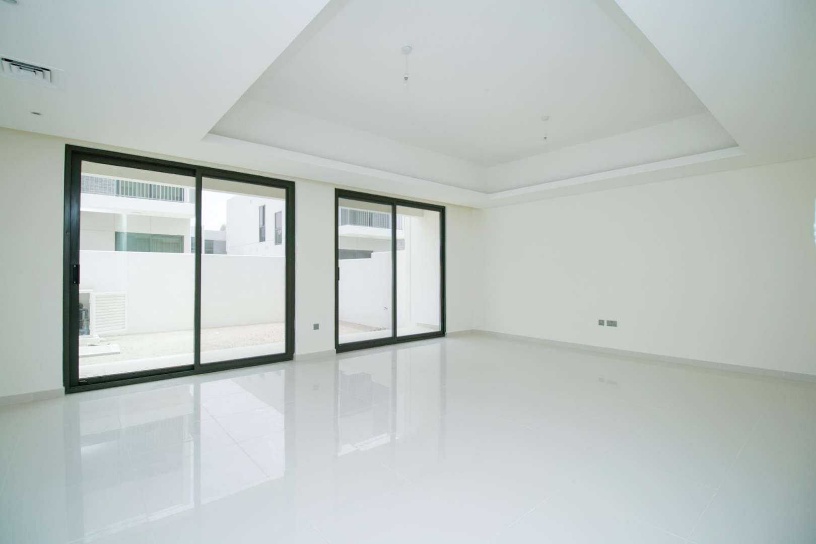 Four-bedroom townhouse exterior in Primrose, Akoya community, available for rent