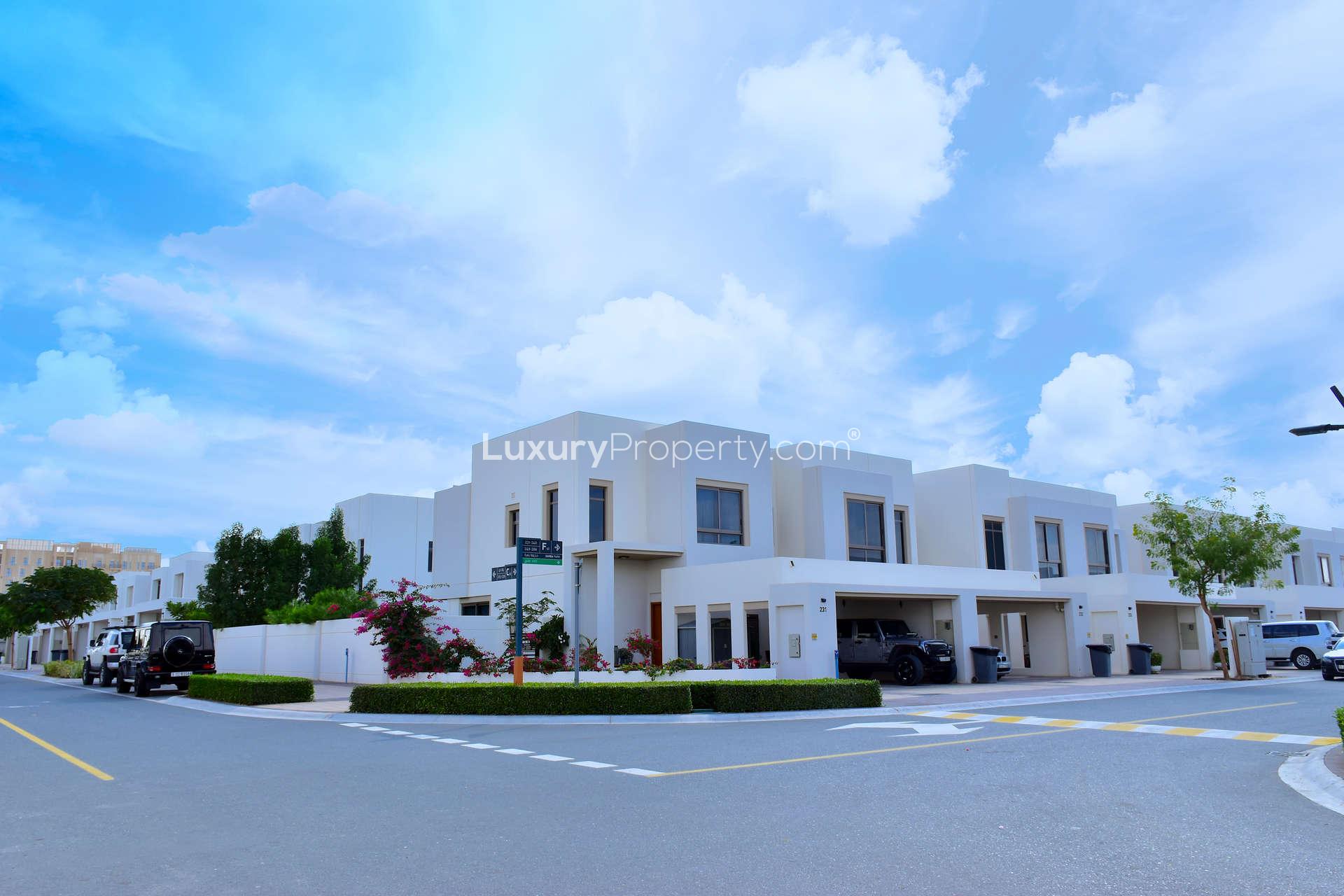 Modern 4-bedroom townhouse exterior in Zahra, Town Square, available for rent