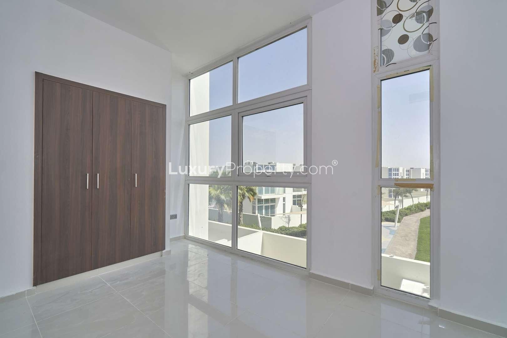 Bright room with large windows in 4-bedroom villa, Damac Hills 2, Sanctuary