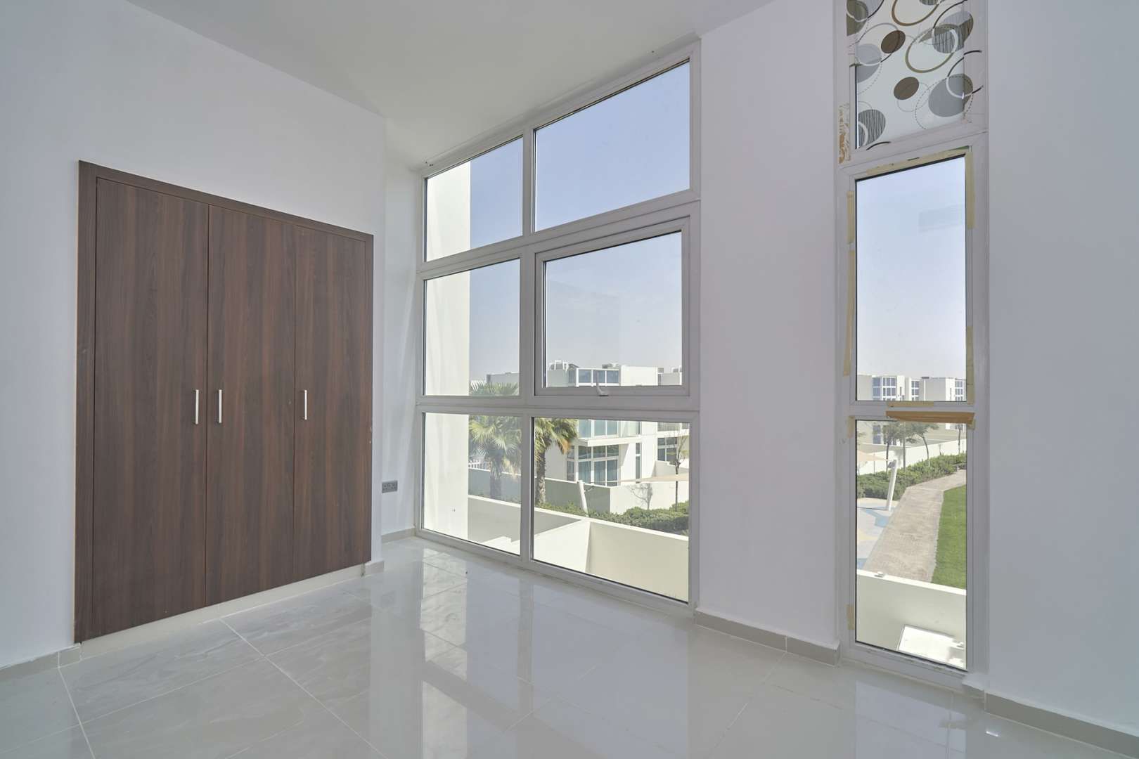 Bright room with large windows in 4-bedroom villa, Damac Hills 2, Sanctuary