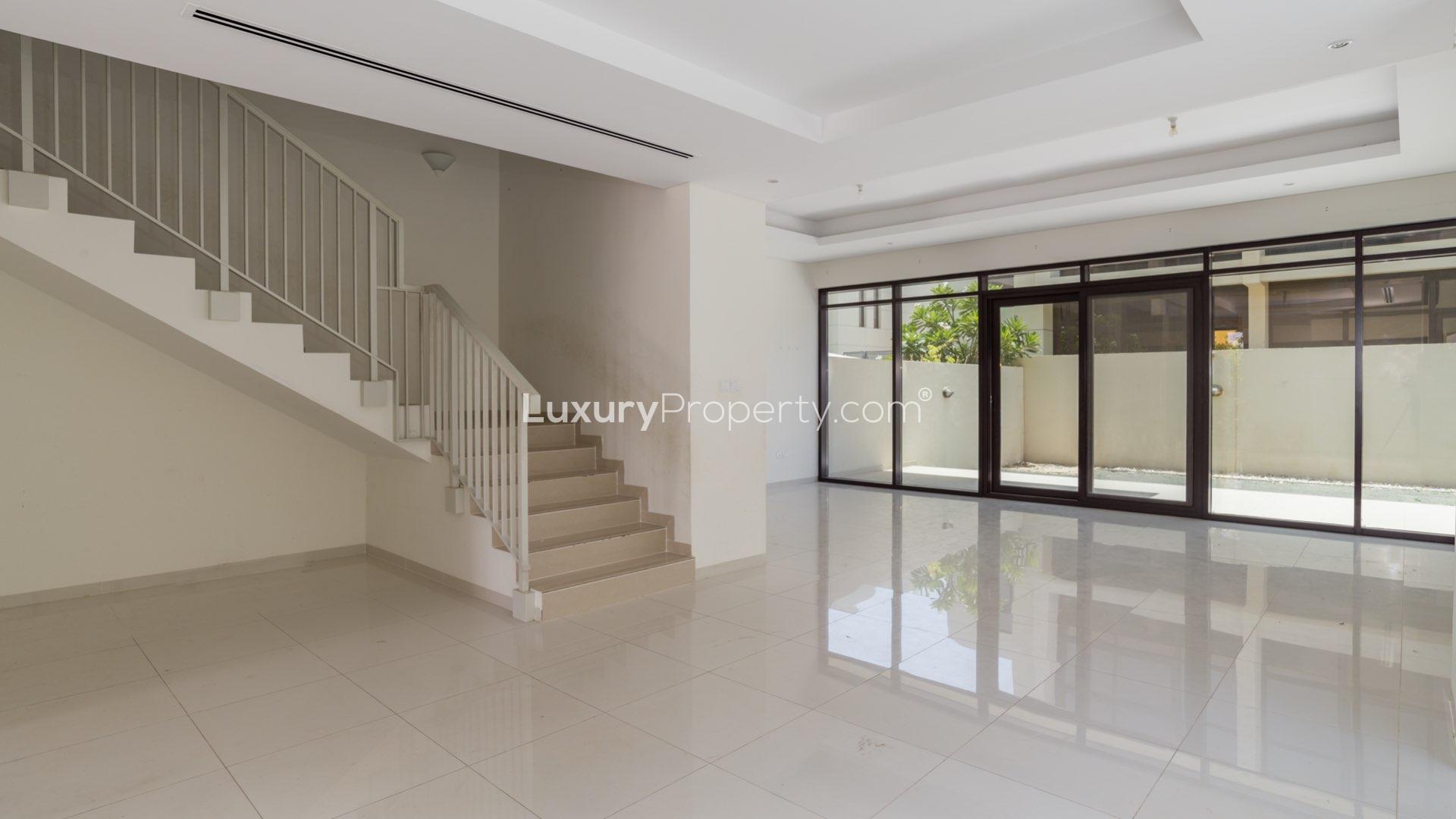 Exterior view of 4-bedroom townhouse for rent in Damac Hills, The Field