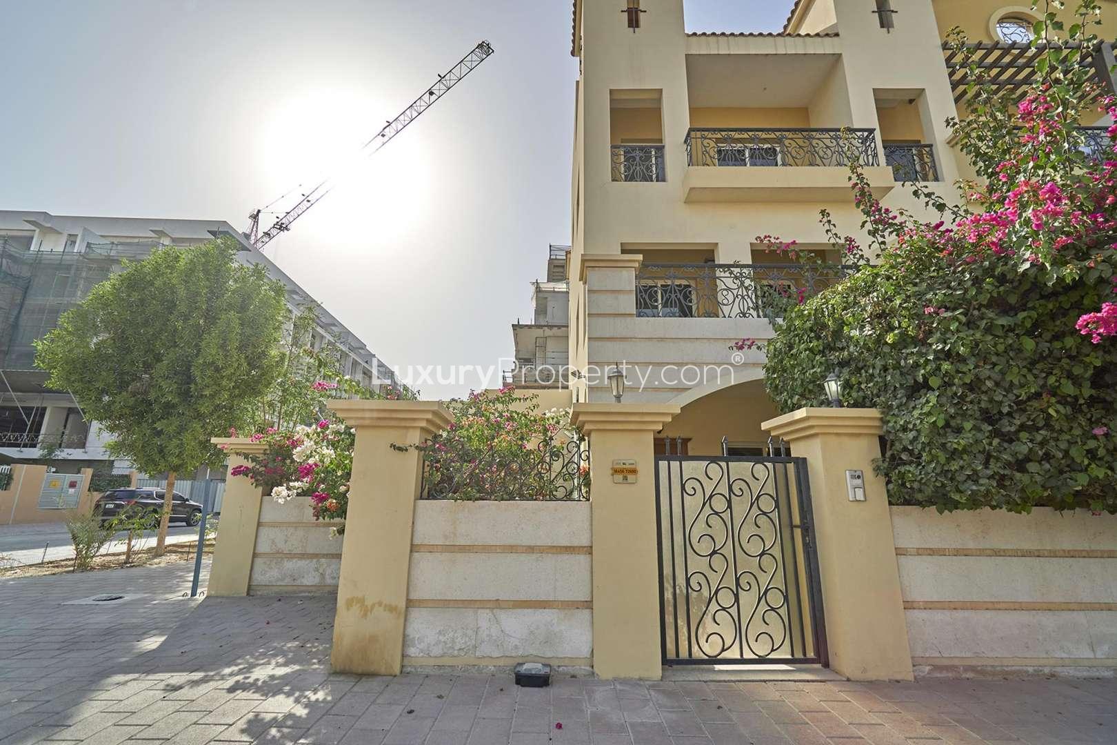 Immaculate living room with modern decor in Valencia Park townhouse, JVC for rent