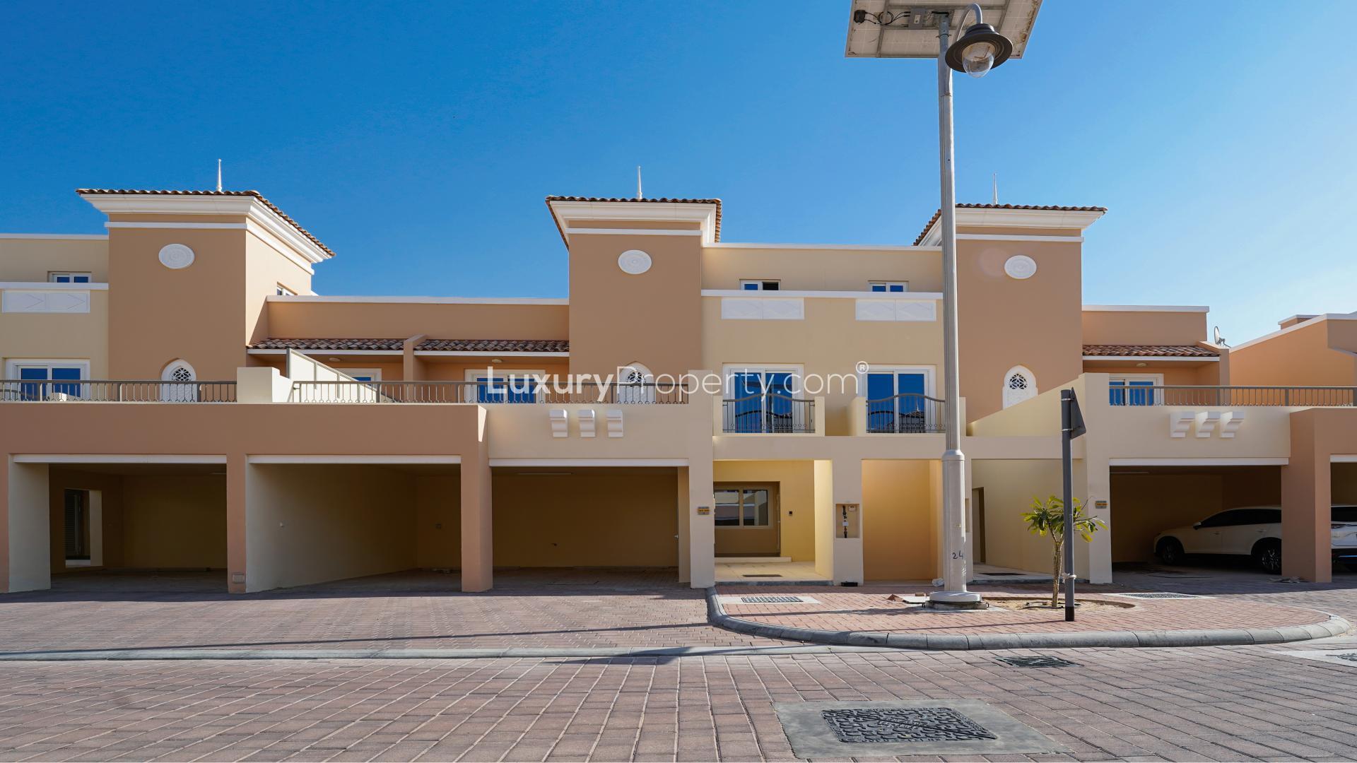 Modern townhouse balcony view in Victory Heights, Dubai Sports City, for rent