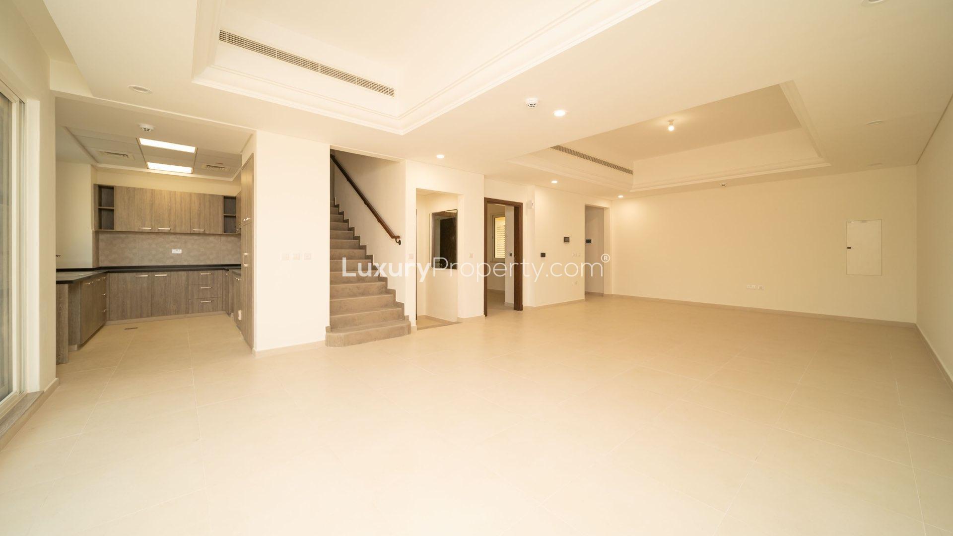 Spacious townhouse terrace in Victory Heights, Dubai Sports City, with scenic community view