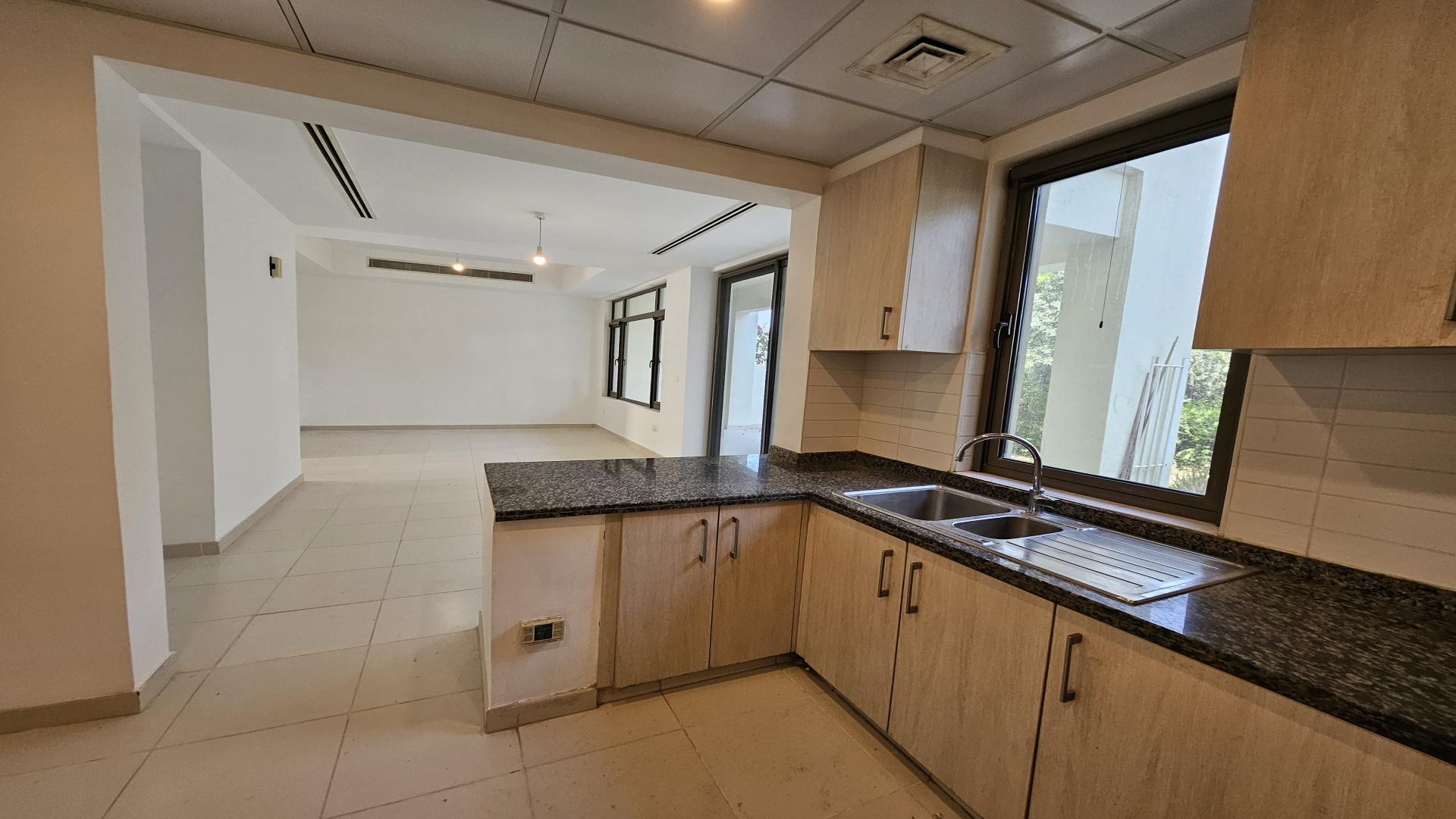 Spacious living area in 4-bedroom townhouse, Mira Oasis 2, Reem, with garden view