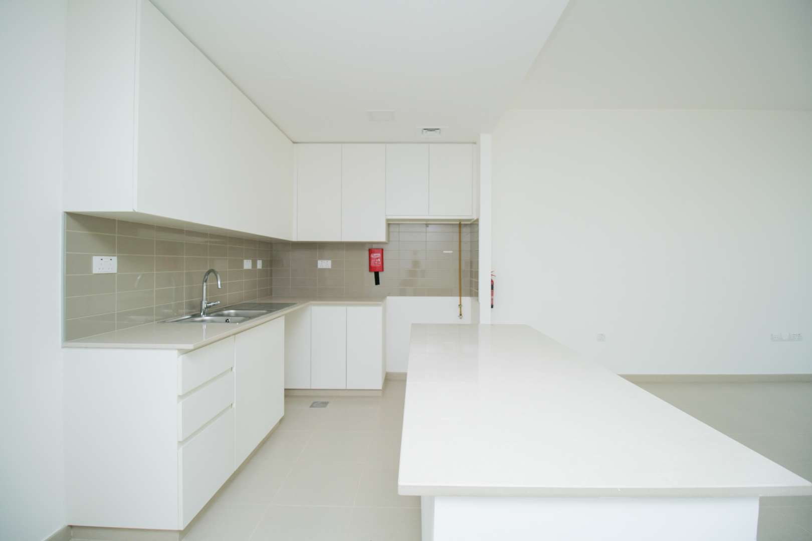 N/A,Modern kitchen in Zahra Townhouse, Town Square with sleek countertops and ample cabinetry