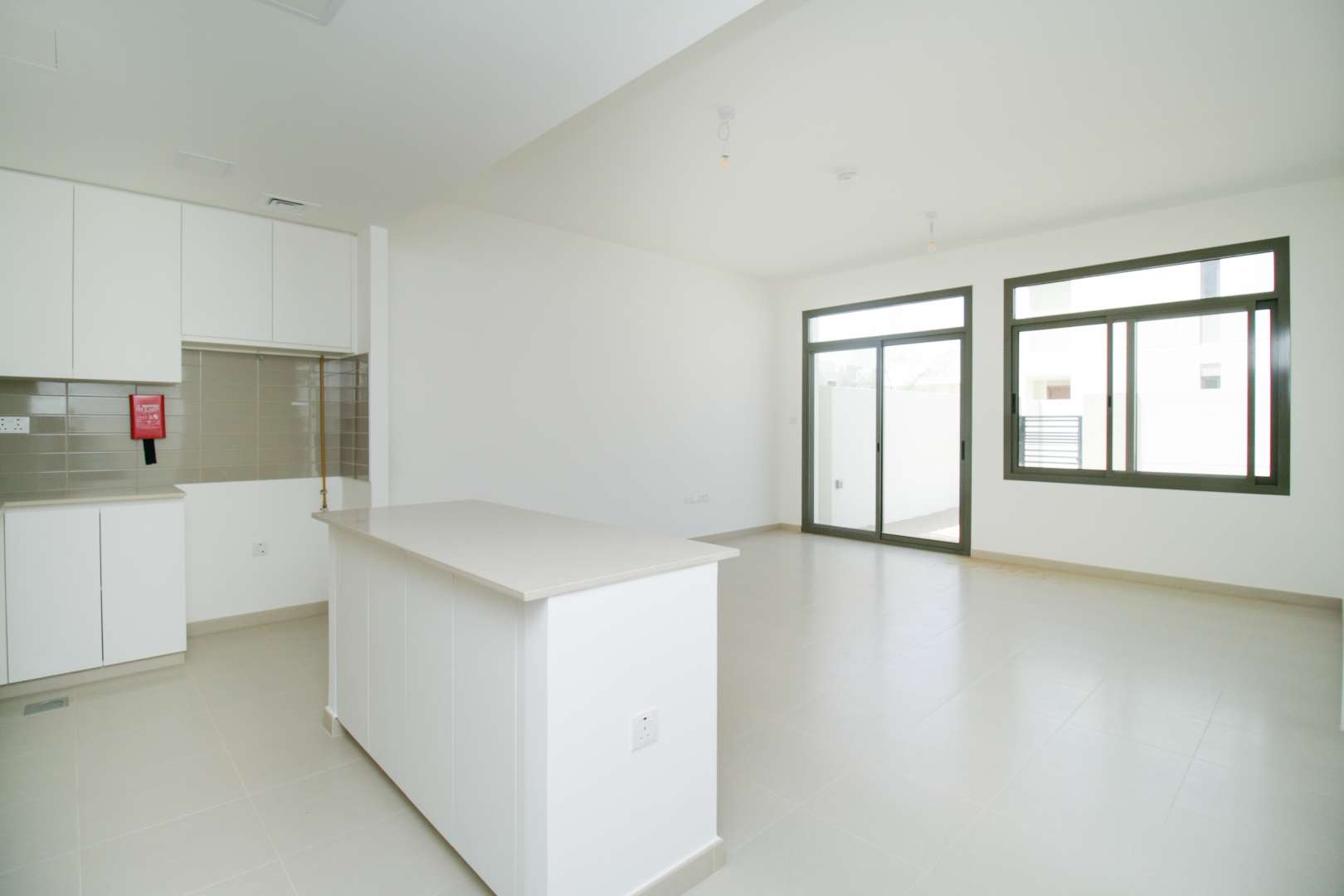 Spacious 3-bedroom end unit townhouse with garden in Zahra, Town Square for rent