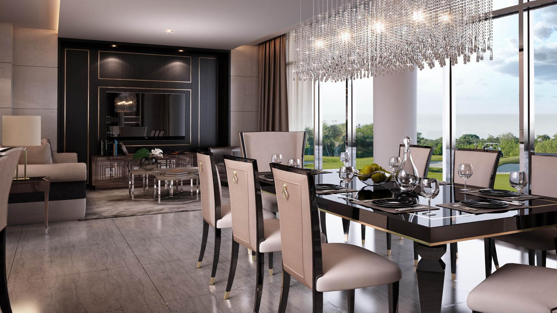 Modern townhouse exterior in Belair Damac Hills, featuring spacious design and golf course view