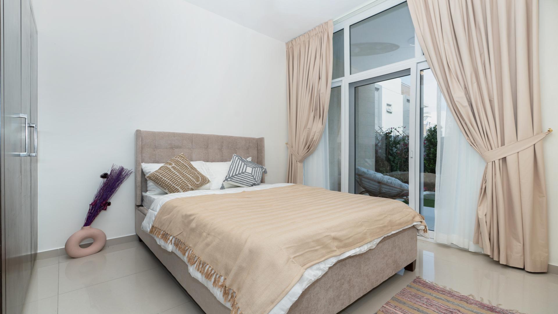 Furnished living room in 4-bedroom townhouse, Victoria, Damac Hills 2, Dubai