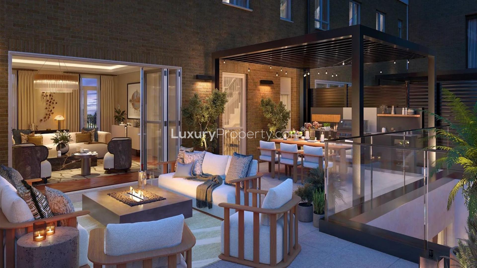 Elegant living room in four-bedroom Fulham Beach townhouse, featuring modern decor and cozy seating