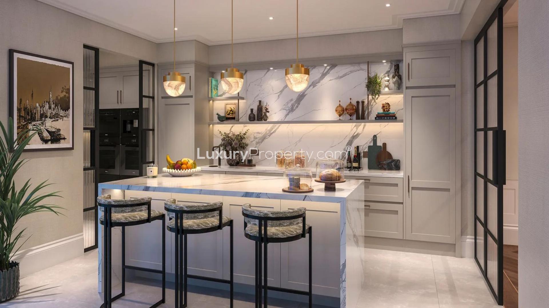 Elegant townhouse patio with cozy seating and dining area in Fulham Beach, London