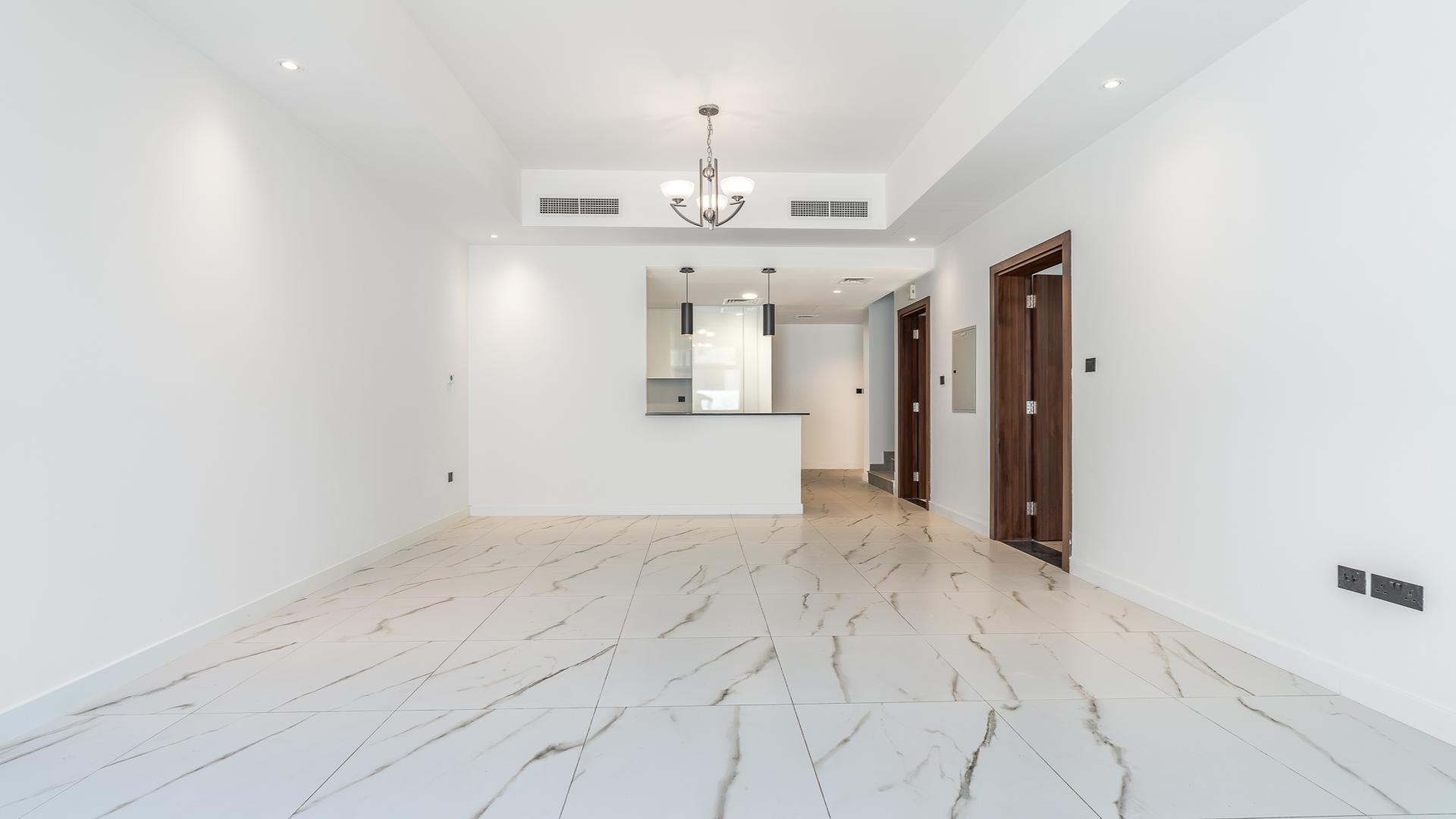 Exterior view of modern 4-bedroom townhouse for sale in Elie Saab a Vie, Meydan