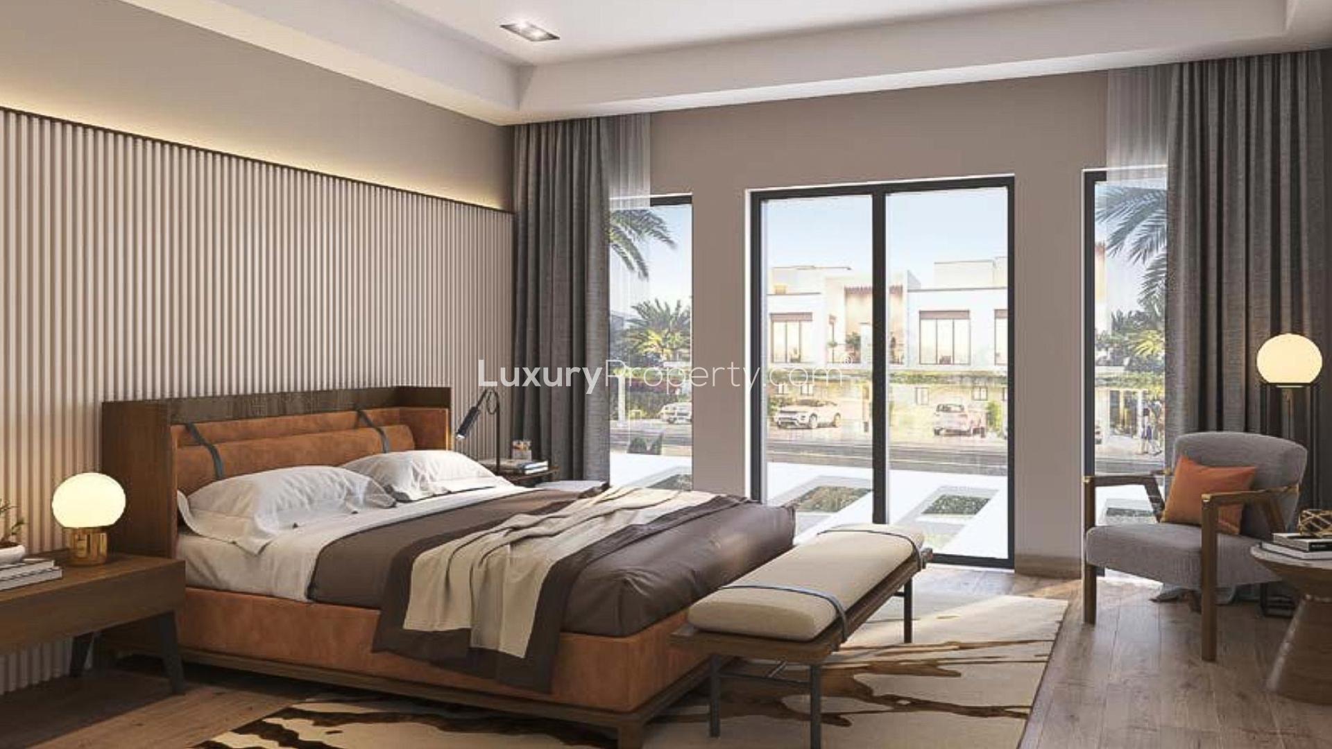 Elegant 4BR townhouse exterior in Damac Riverside, Lush community, modern design, for sale