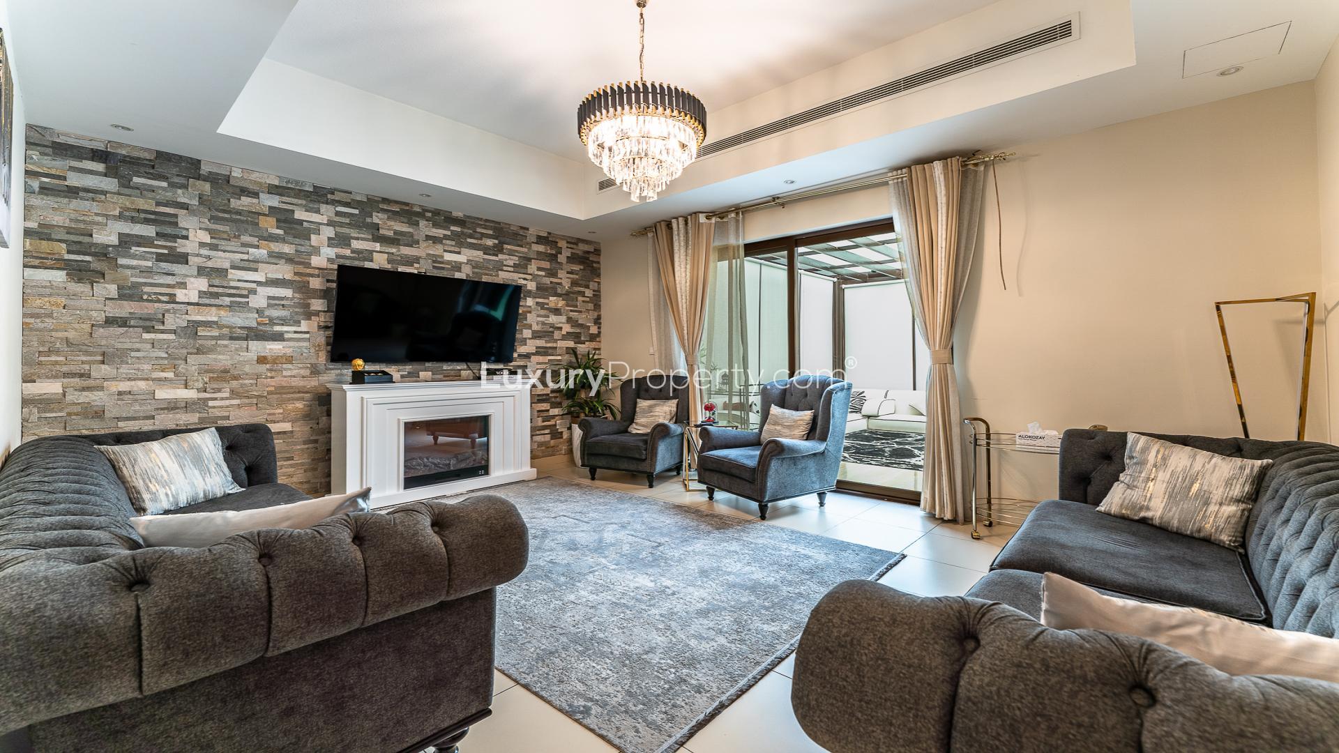 Entrance of modern townhouse in Mira 2, Reem community, featuring elegant interior design