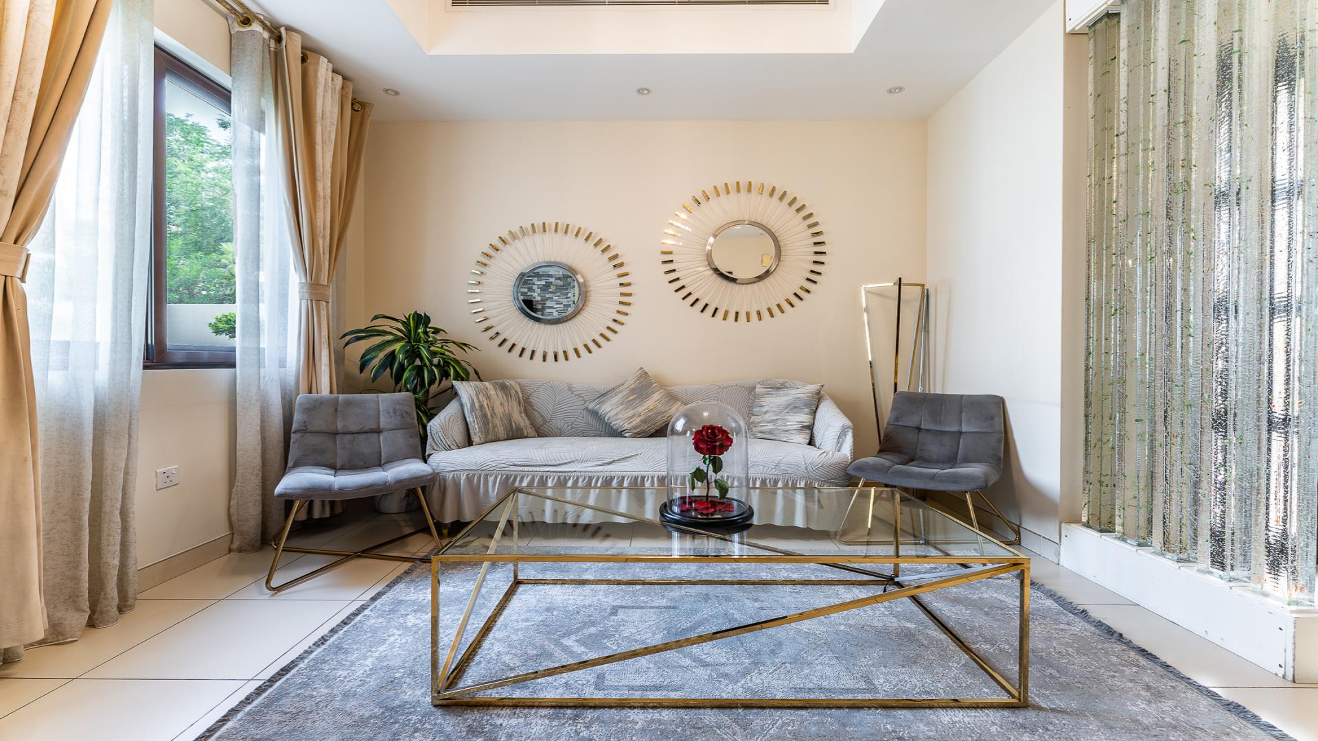 Luxurious living room in Mira 2 townhouse, featuring elegant decor and modern furnishings
