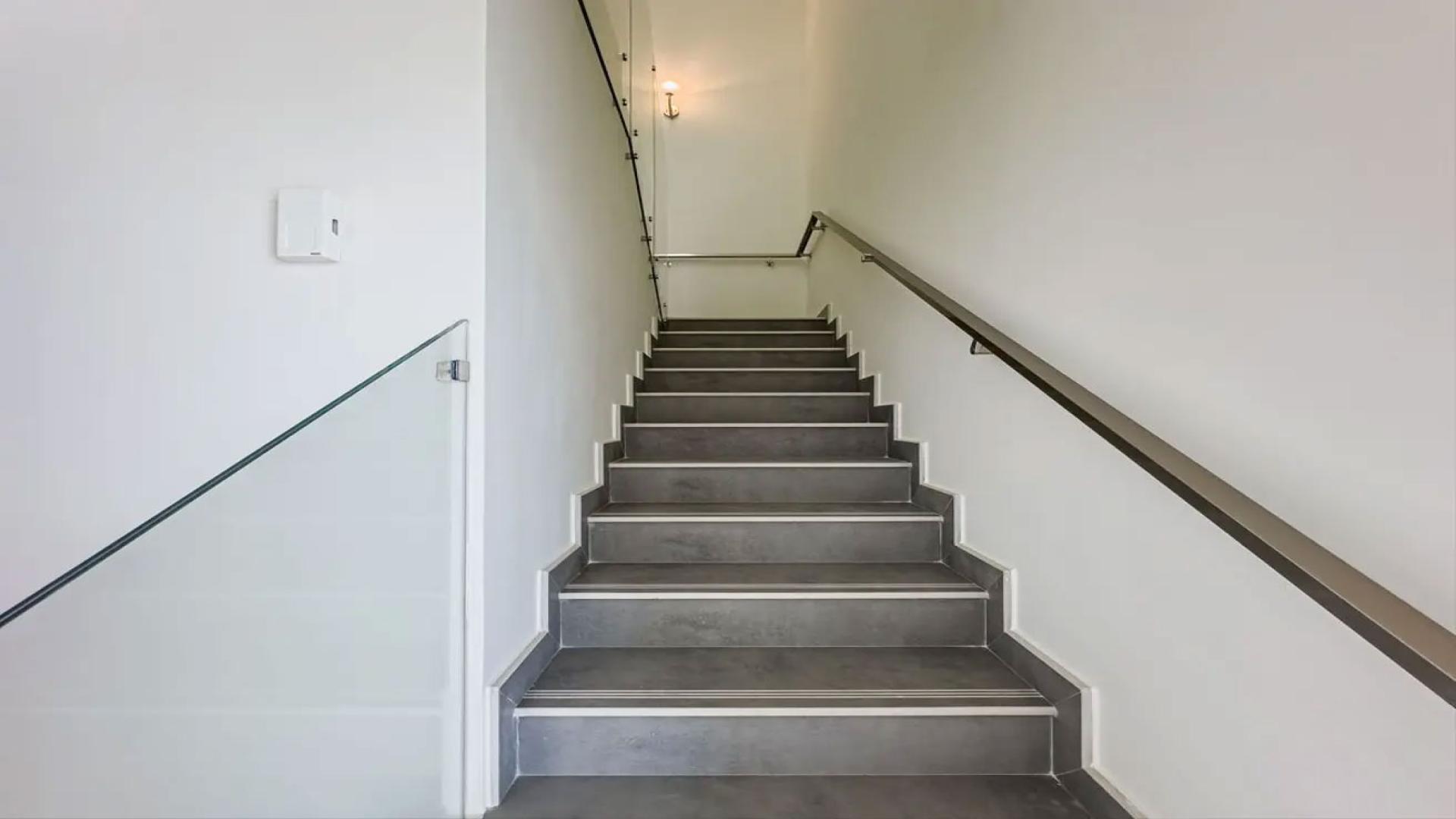 Staircase inside Elie Saab-branded townhouse in Meydan, elegant design, modern finishes