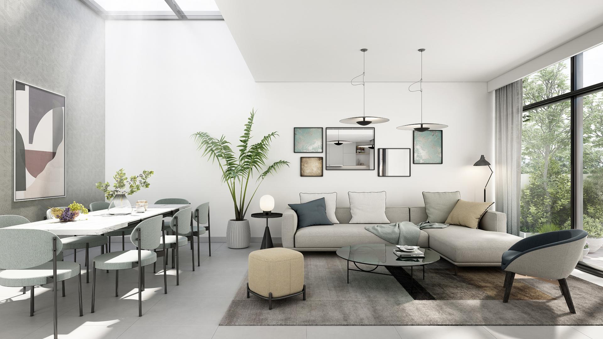 "Scenic view of townhouses in Ruba, Arabian Ranches 3, featuring lush greenery and pathways.",Modern living and dining area in Ruba townhouse, Arabian Ranches 3, with stylish decor