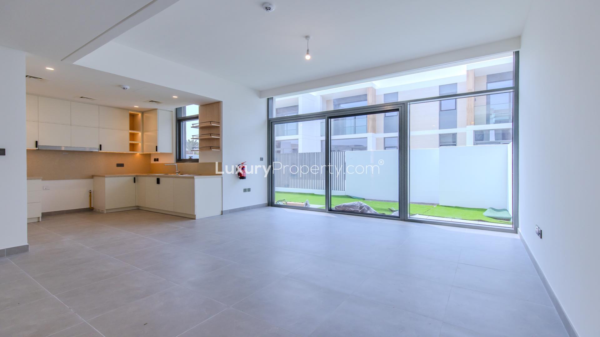 Modern kitchen and living area in 4-bedroom townhouse, Ruba, Arabian Ranches 3