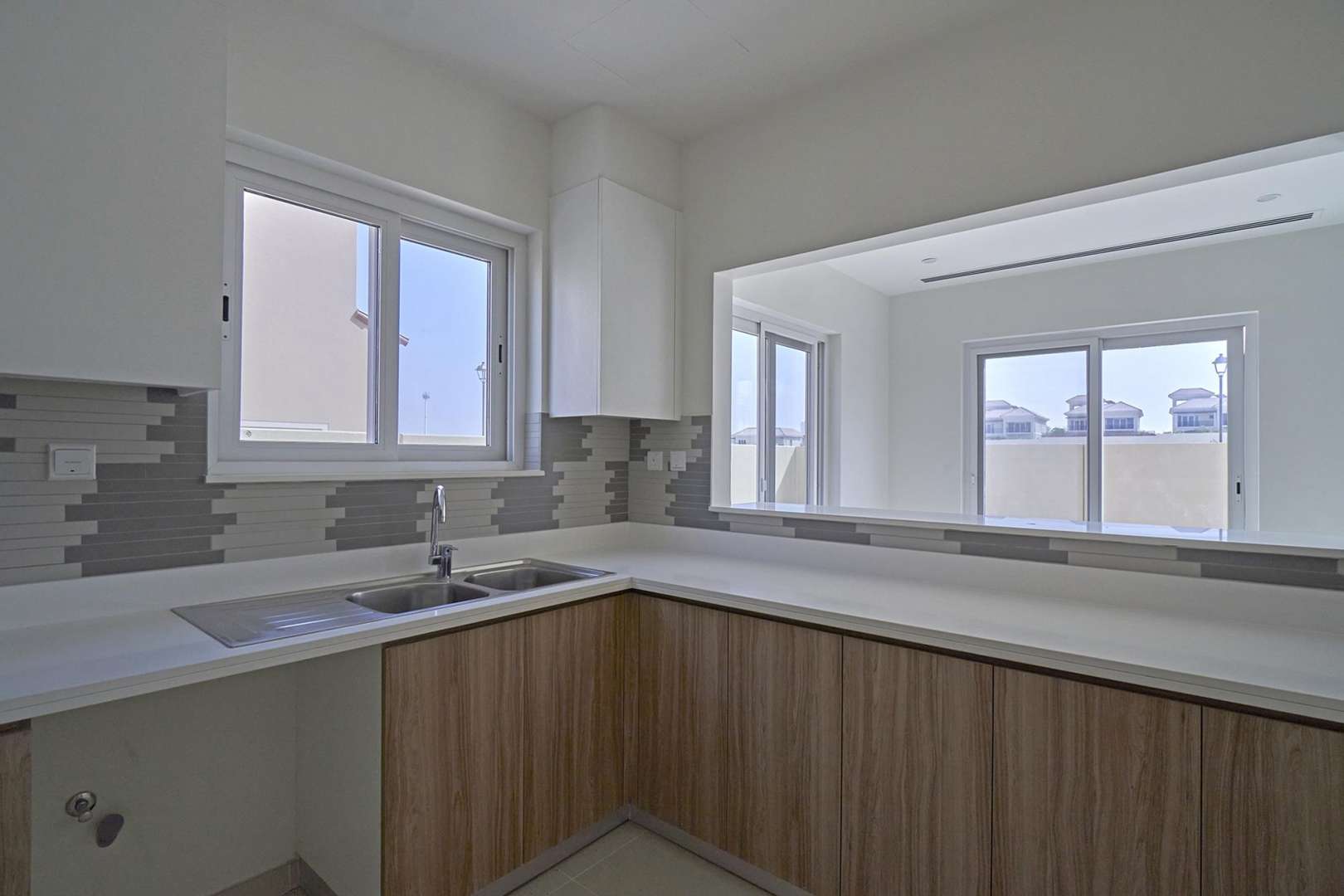 4-bedroom corner townhouse exterior in Amaranta, Villanova with large garden, for sale