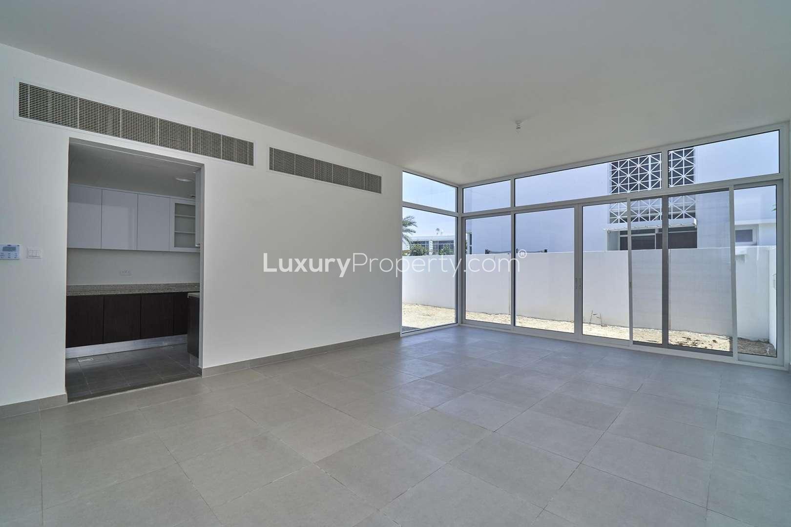 Spacious living area with large windows in Arabella 1 townhouse, Mudon for sale