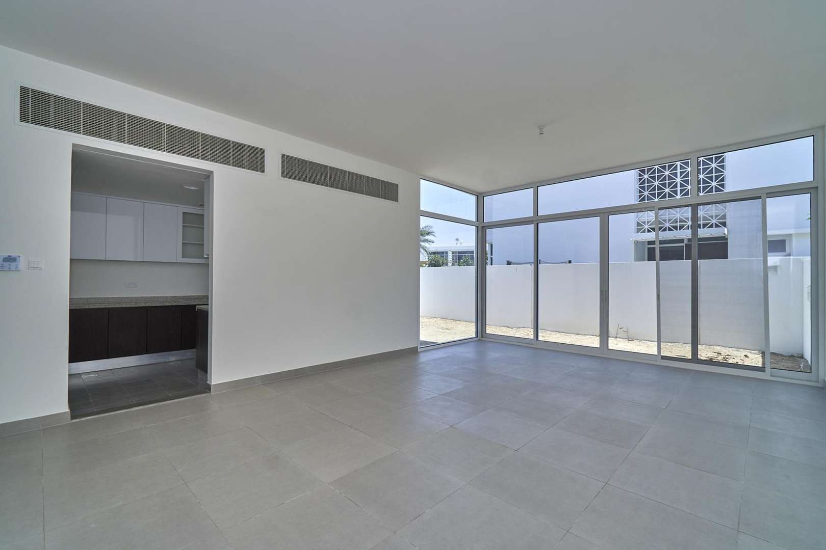 Spacious living area with large windows in Arabella 1 townhouse, Mudon for sale