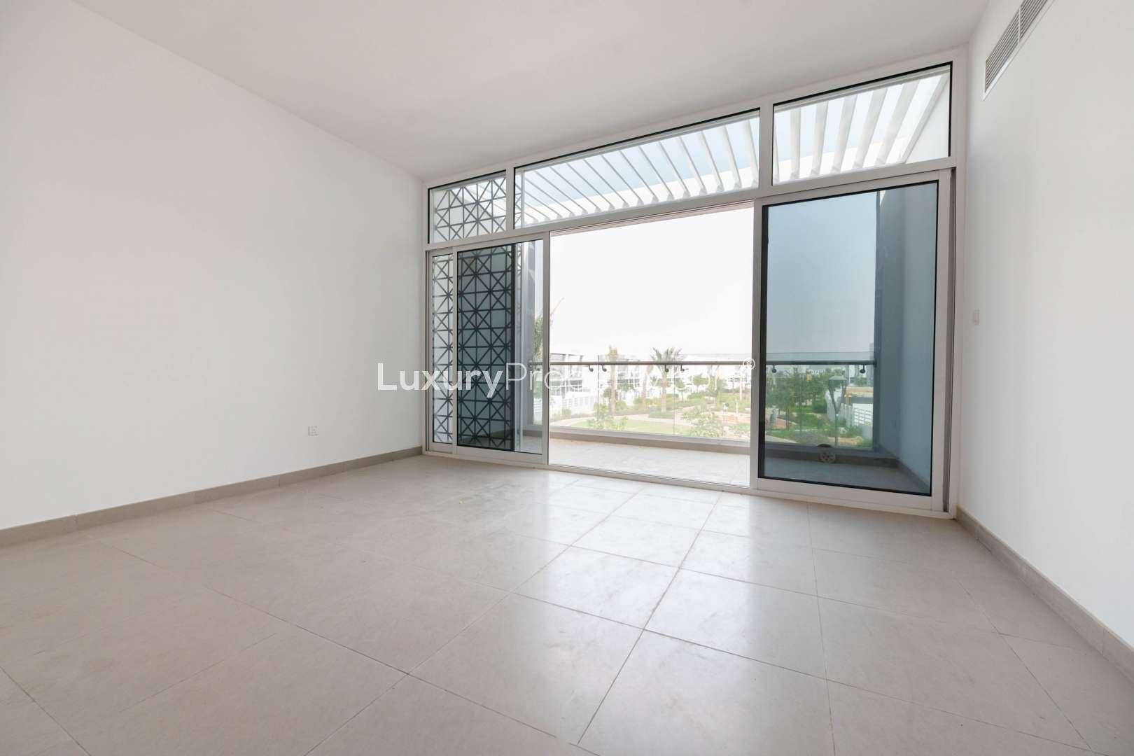 Street view of modern townhouses in Arabella 2, Mudon, Dubai, for sale