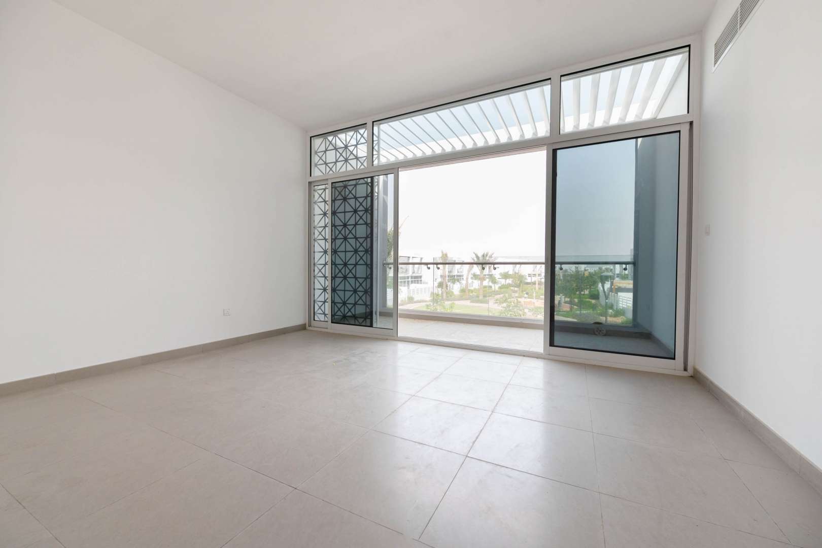 Street view of modern townhouses in Arabella 2, Mudon, Dubai, for sale