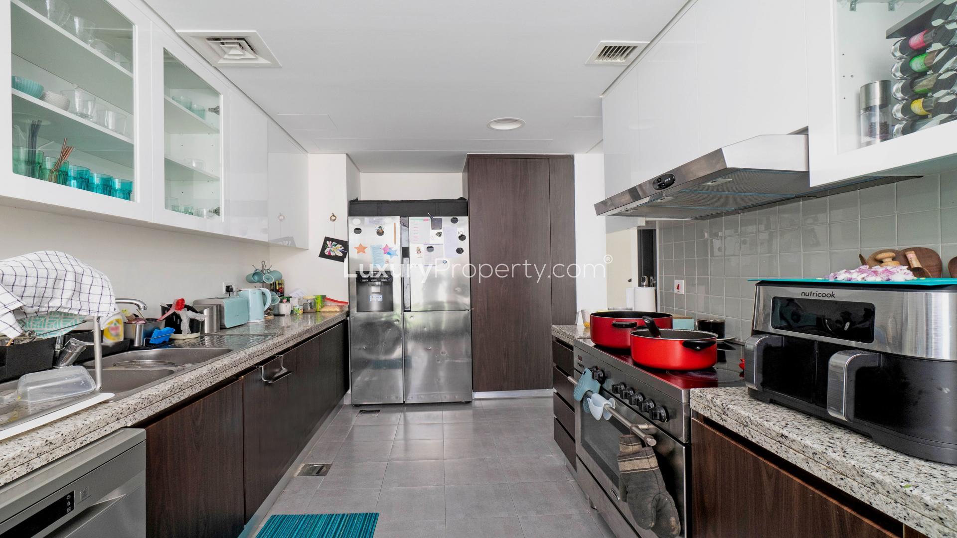 Modern living and dining area in Arabella Townhouses, Mudon with stylish decor and natural light