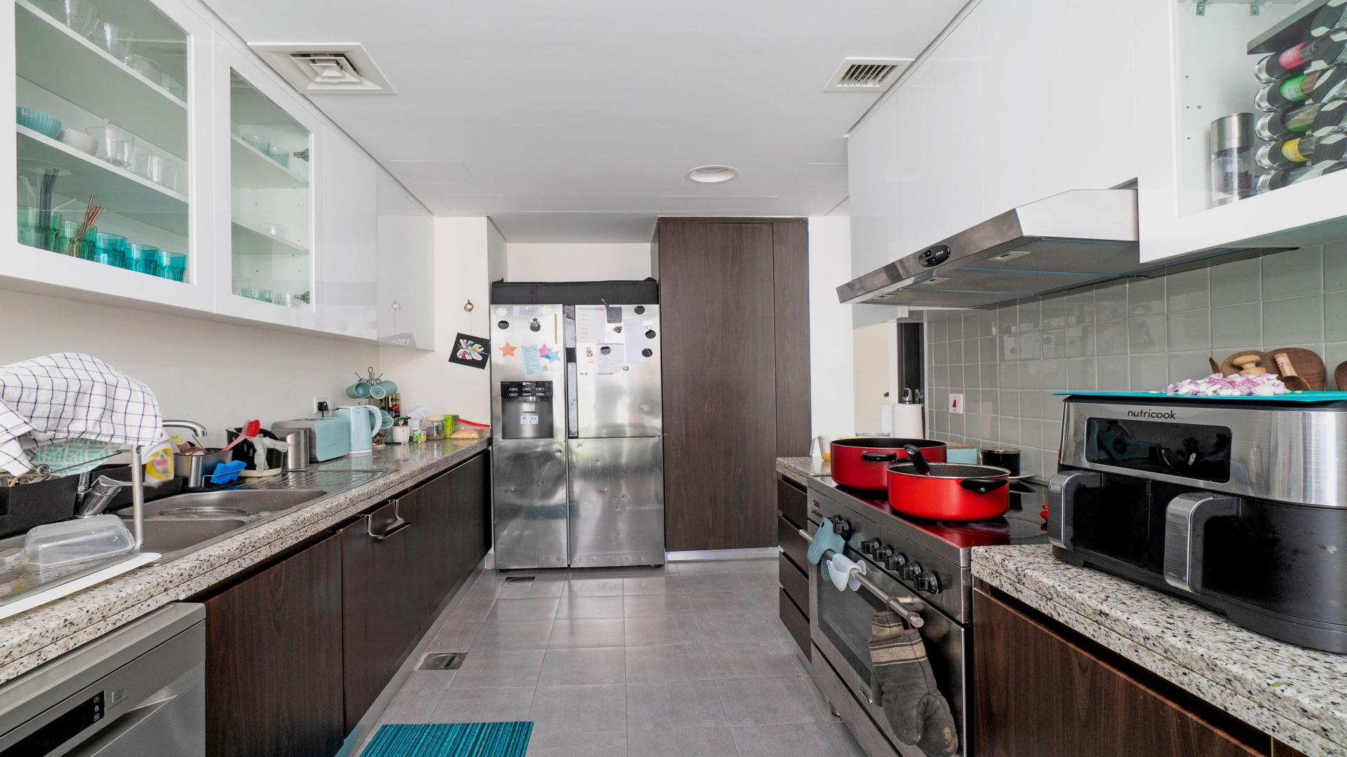 Modern living and dining area in Arabella Townhouses, Mudon with stylish decor and natural light