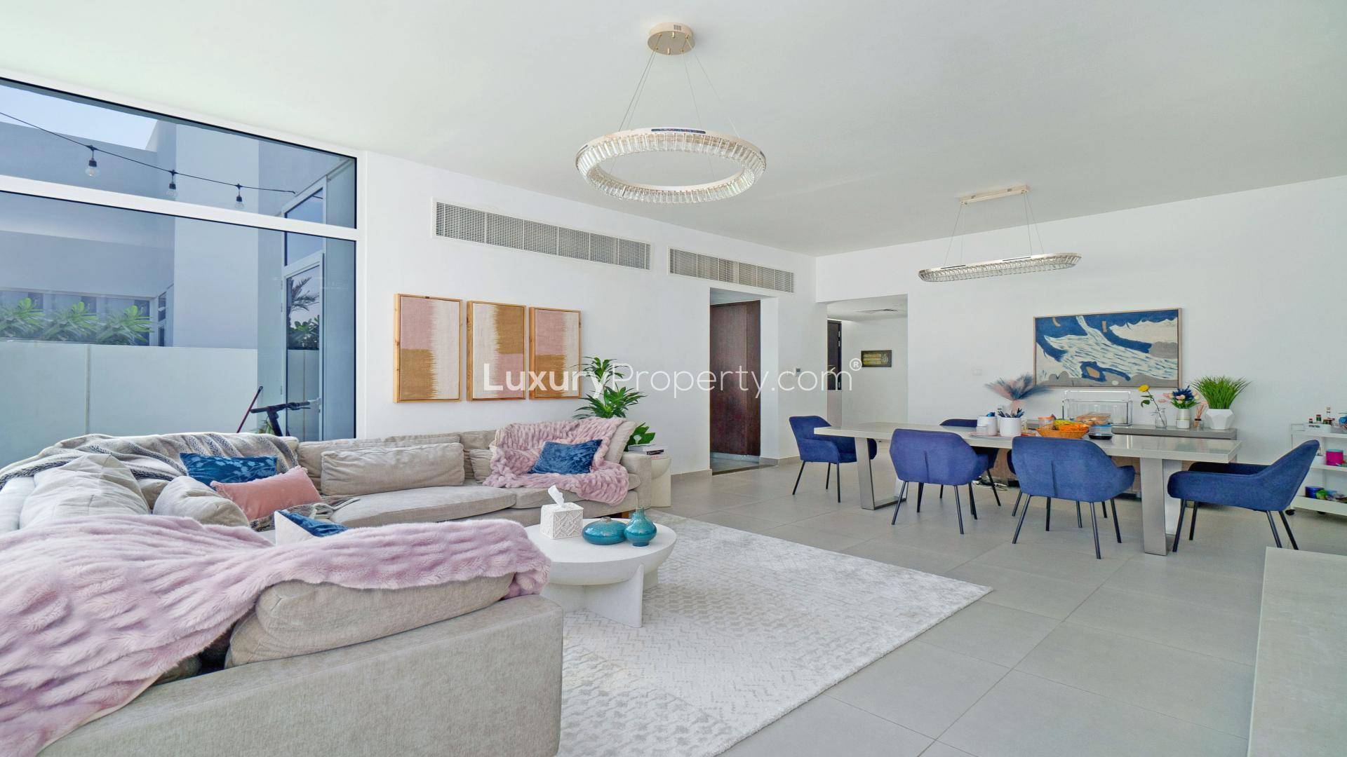 Modern living and dining area in Mudon Arabella townhouse for sale, bright and spacious