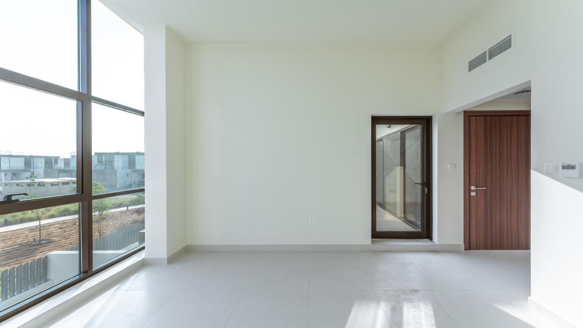 Modern townhouse patio with green lawn in Senses at The Fields, District 11