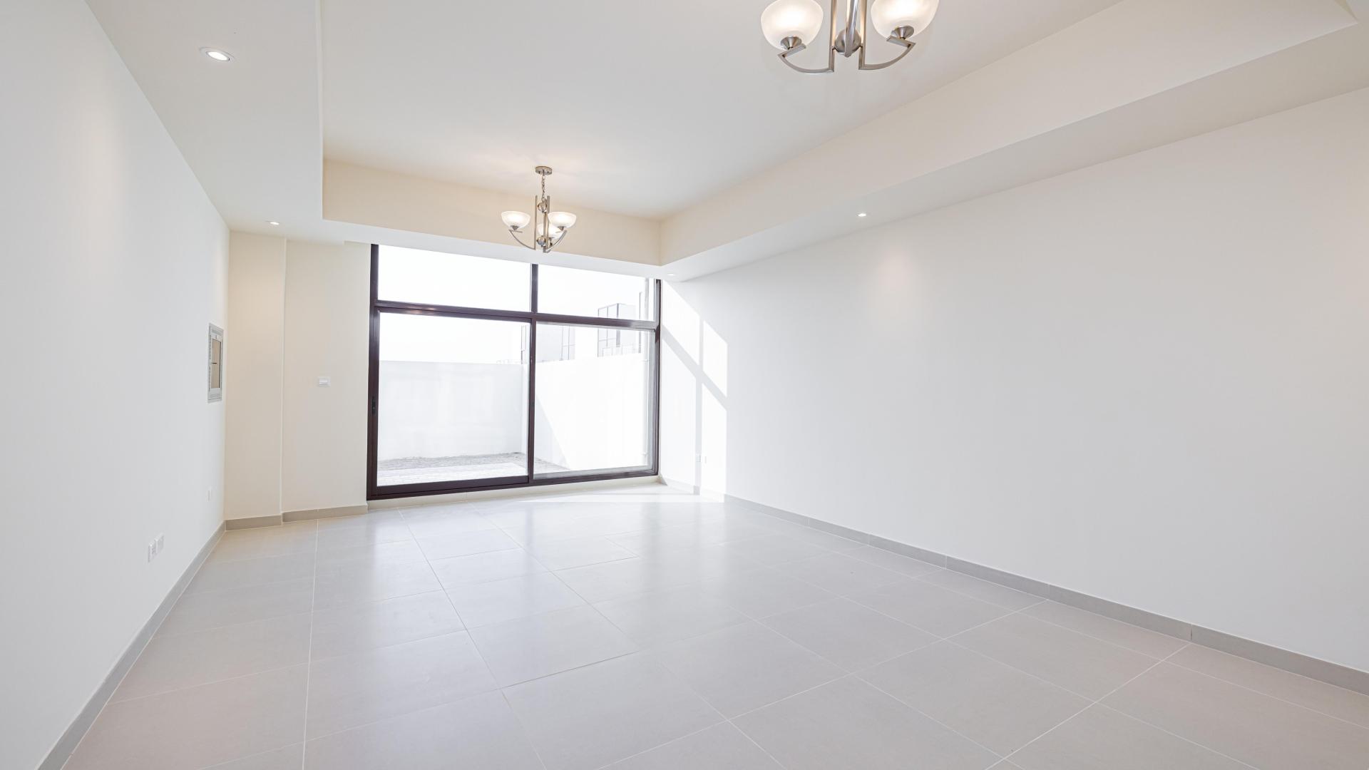 Exclusive 4-bedroom townhouse exterior in Senses at The Fields, MBR City, District 11