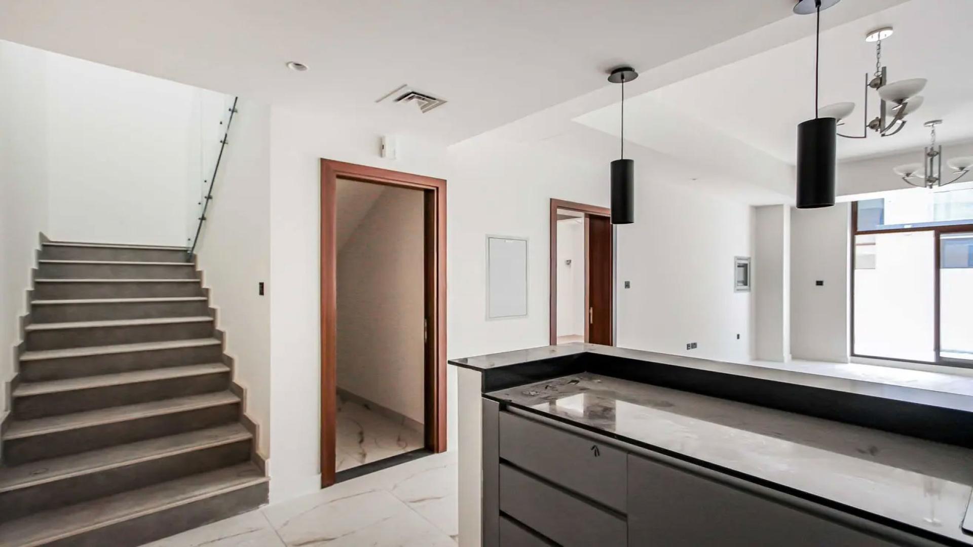 Exterior view of modern townhouse patio in District 11, Mohammed Bin Rashid City