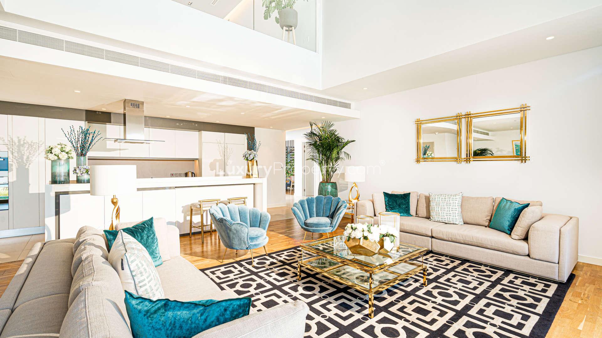 Modern bathroom in Bluewaters townhouse, featuring sleek fixtures and elegant decor elements