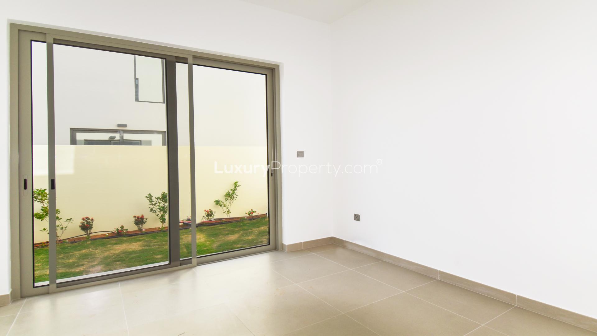 Bright room with built-in wardrobes and garden view in Camelia townhouse, Arabian Ranches 2