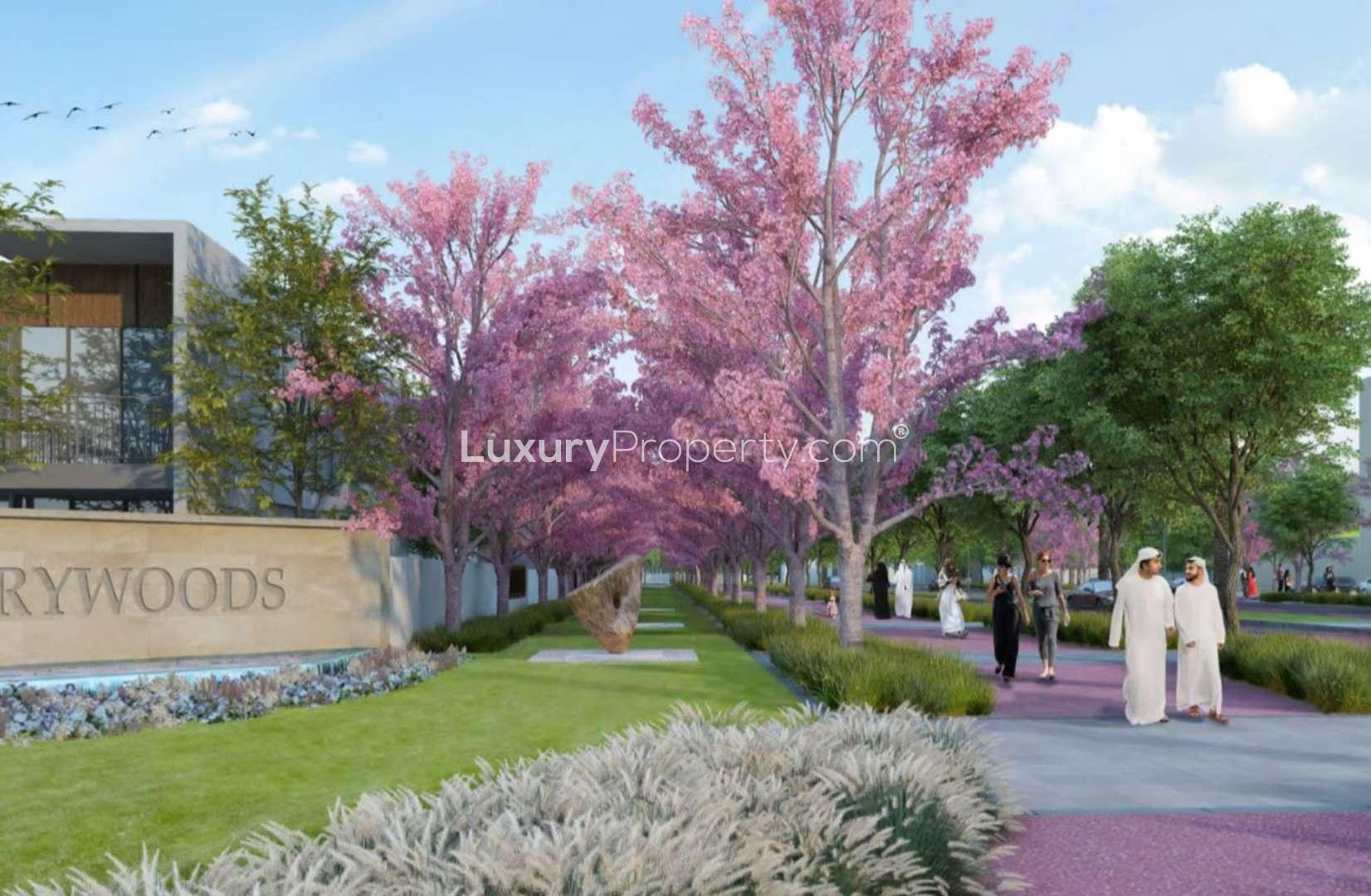 Modern open-plan living area in Cherrywoods townhouse, featuring elegant decor and garden views