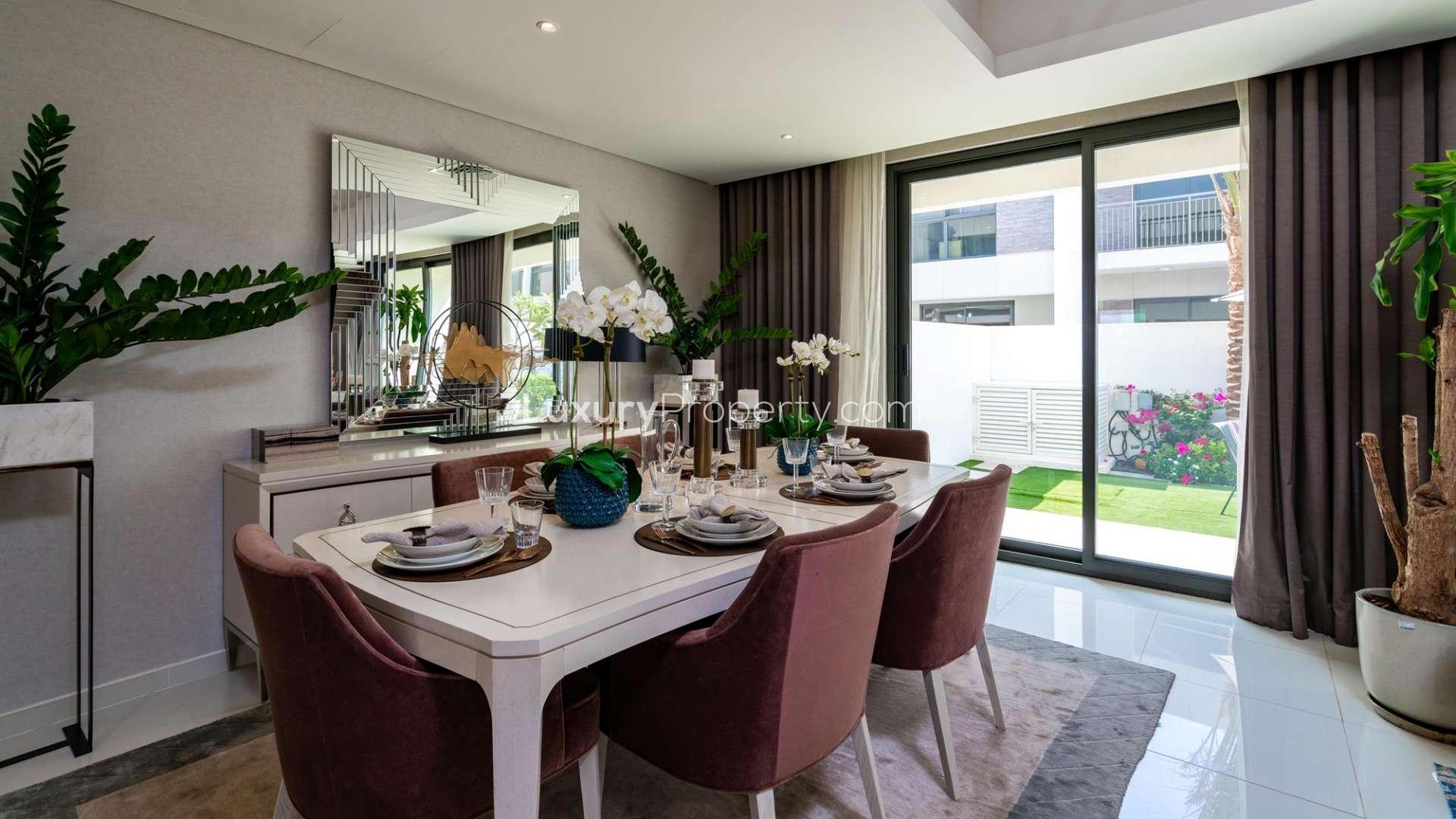 Luxurious living room in upgraded 4-bed Aurum Villa, Claret, Akoya community townhouse