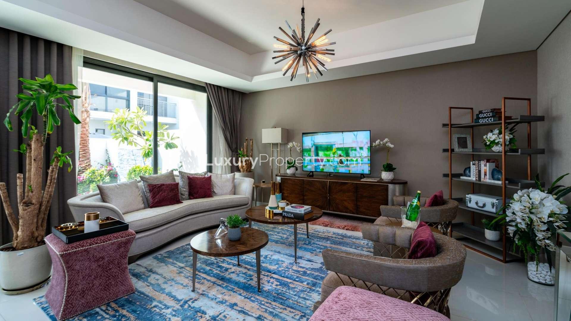 4-bedroom villa garden with patio furniture in Claret, Damac Hills 2