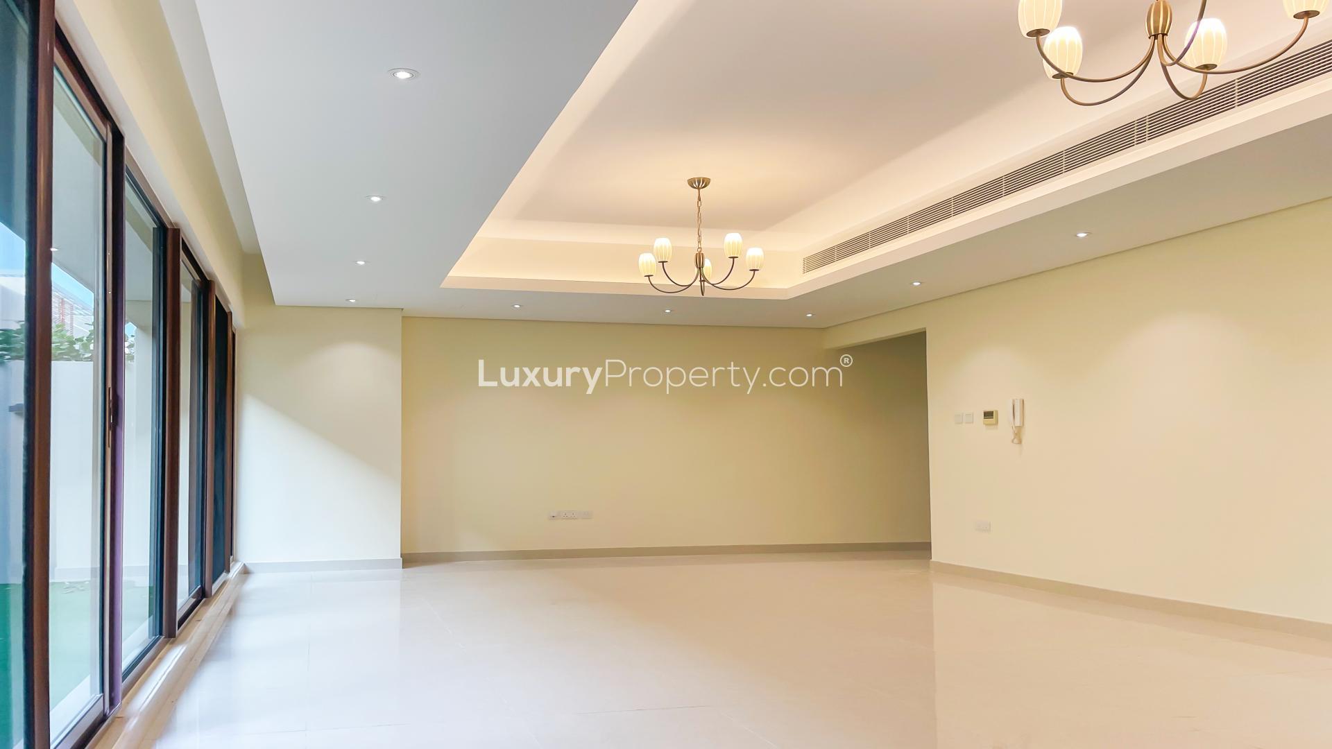 Modern kitchen in Meydan townhouse for sale, featuring sleek cabinetry and spacious layout