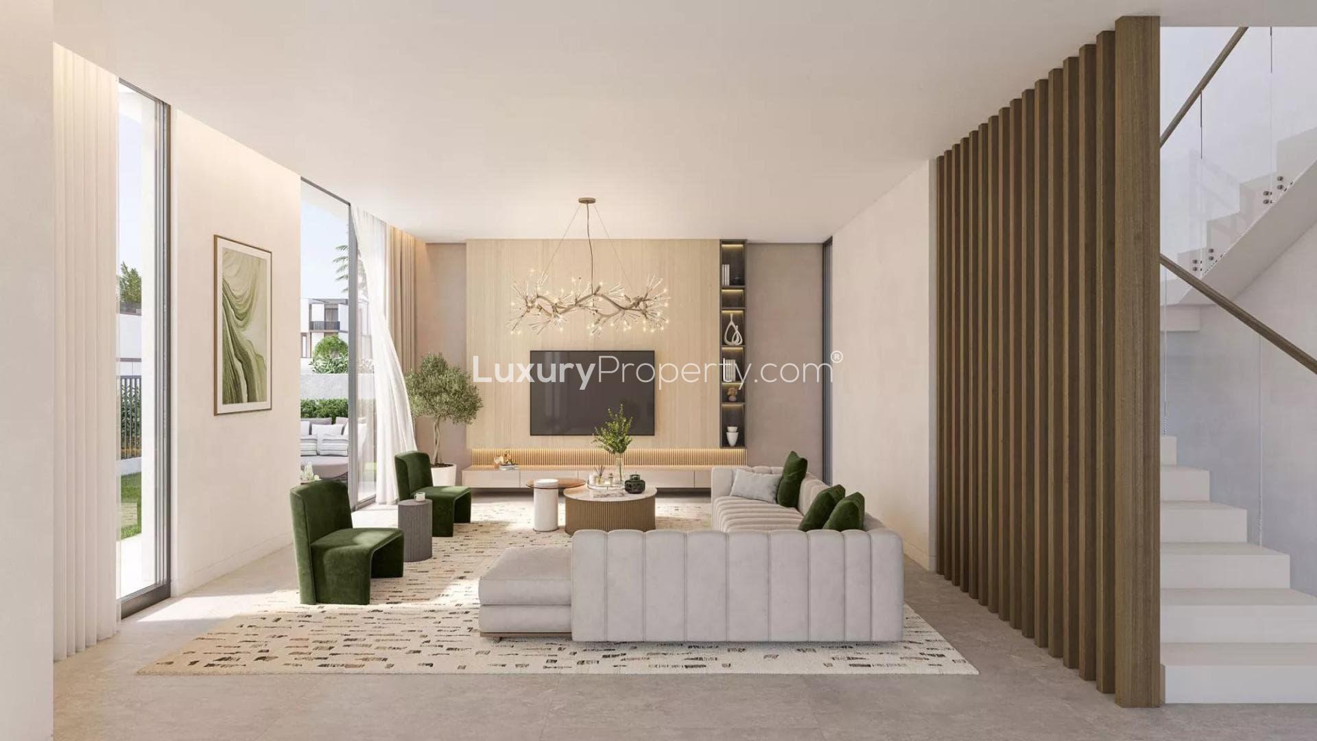 Modern kitchen and dining area in Dubai Land townhouse for sale, spacious and elegantly designed