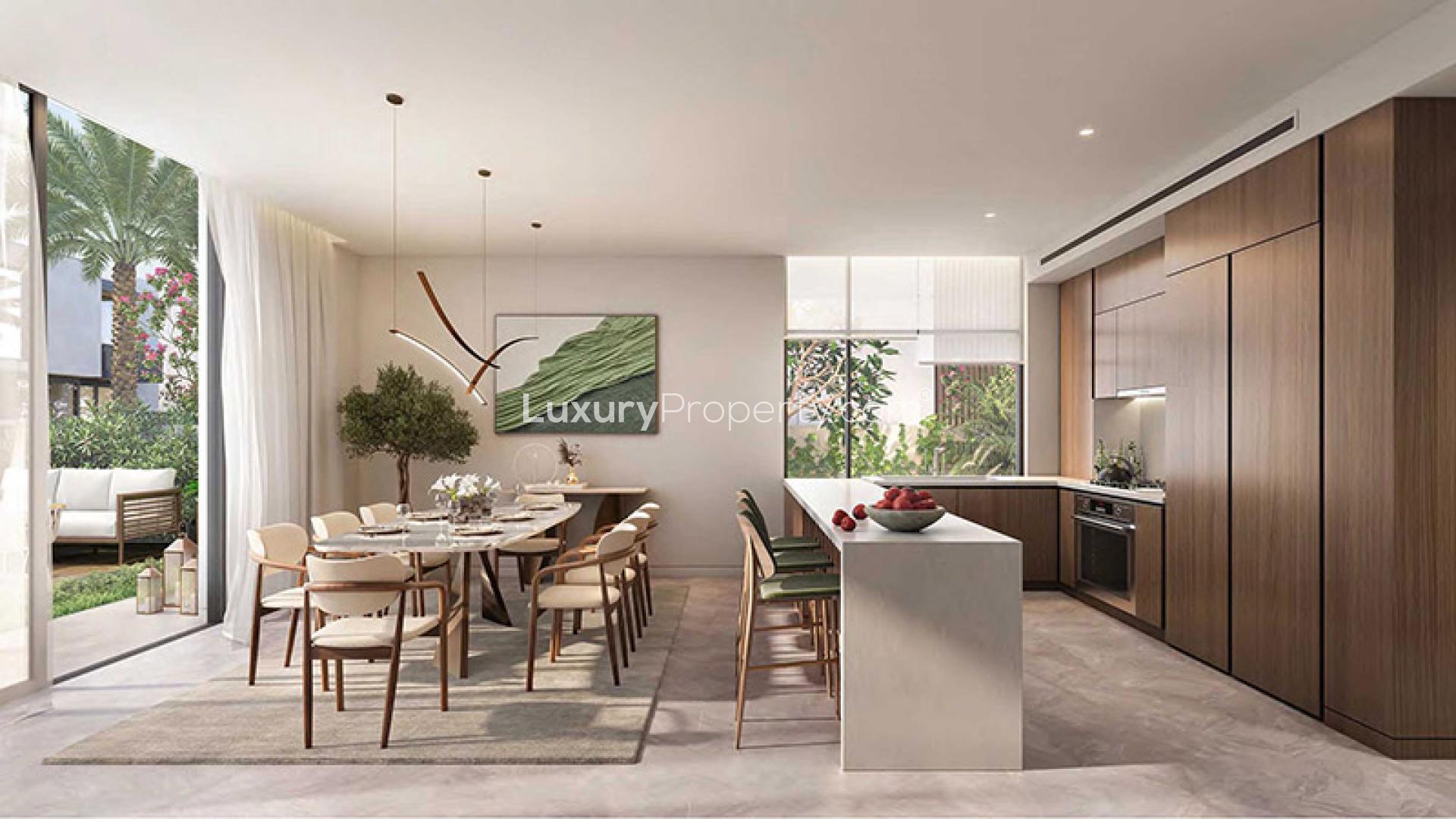 Modern 4-bedroom townhouse exterior with garden in Haven, Dubai Land, for sale