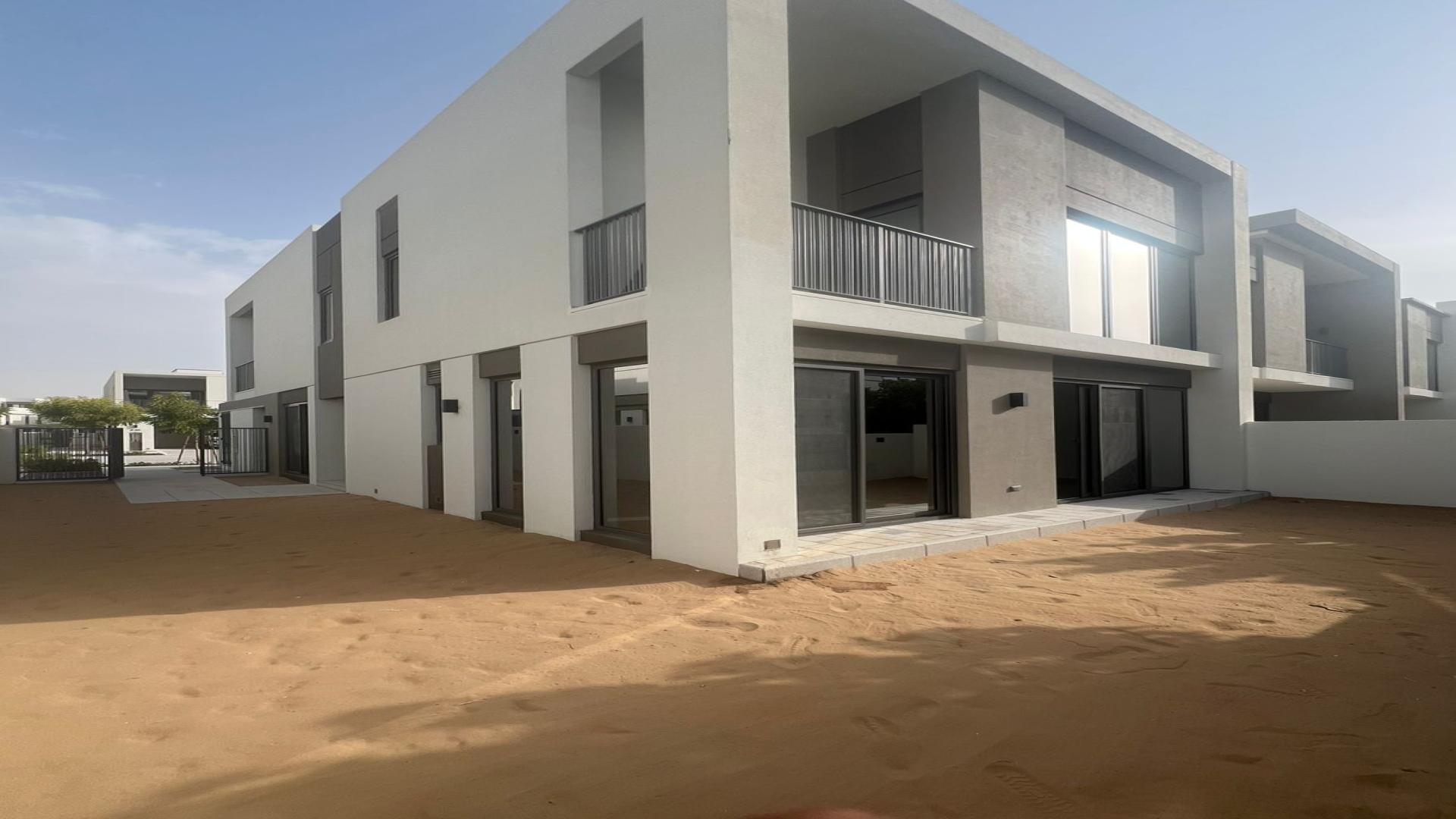 Modern 4-bedroom townhouse exterior in Aura Gardens