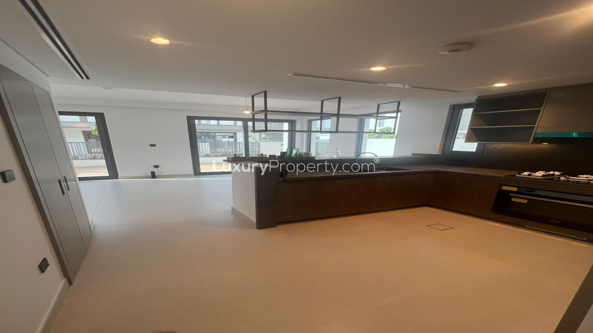 Modern 4-bedroom townhouse exterior in Aura Gardens, Tilal Al Ghaf, for sale