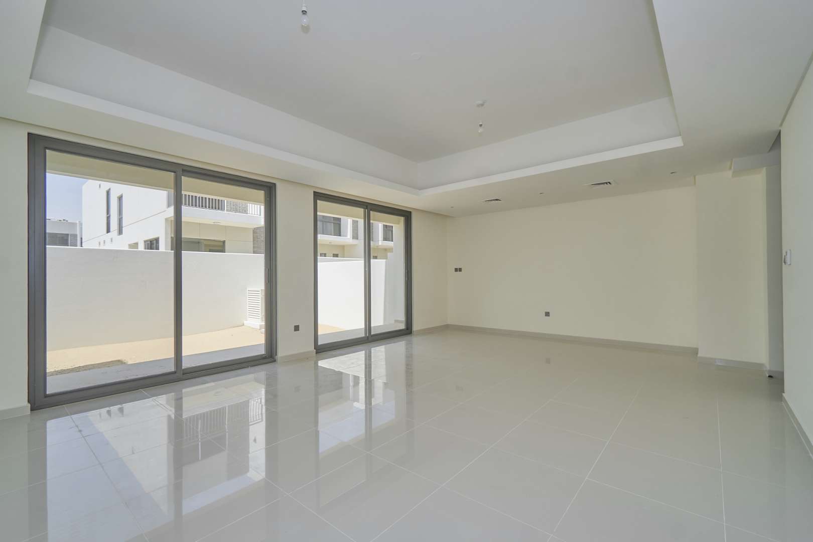 Spacious living room in four-bedroom townhouse, Juniper, Damac Hills 2, for sale
