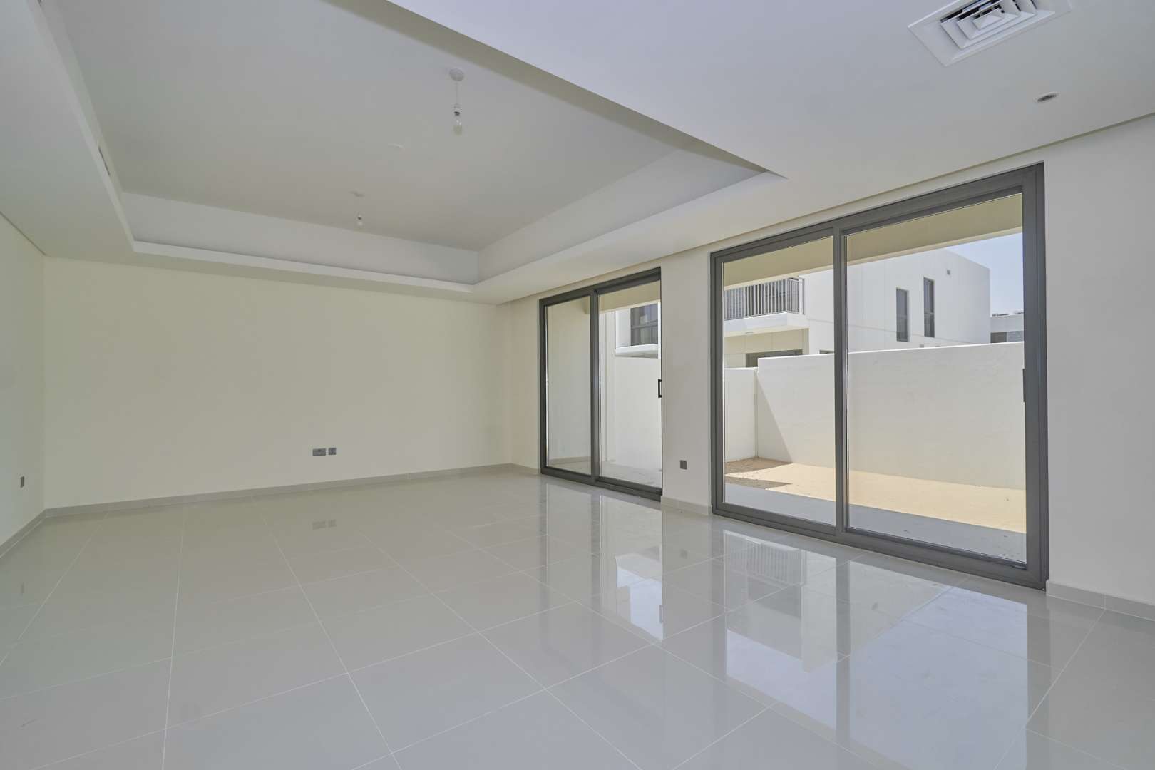 Four-bedroom townhouse exterior in Juniper, Damac Hills 2, for sale