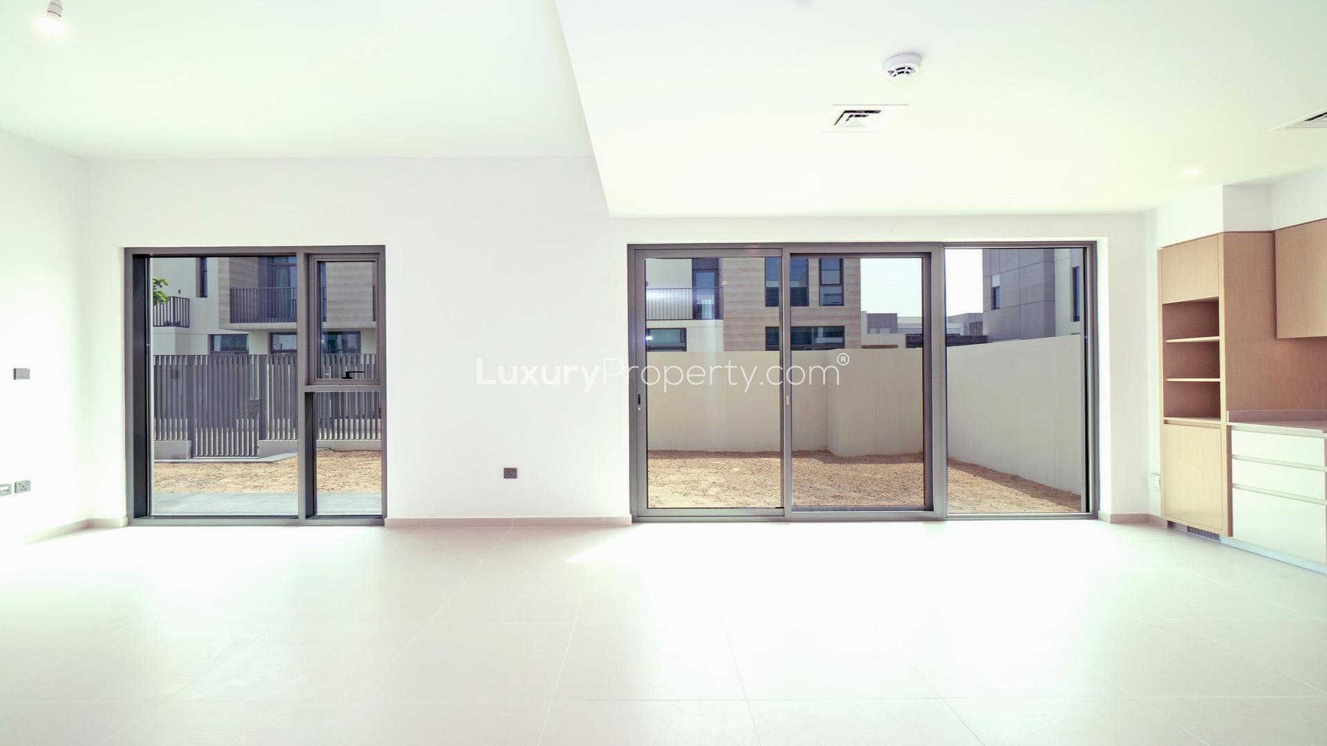 Single-row villa exterior in Joy, Arabian Ranches 3, featuring modern design and spacious layout